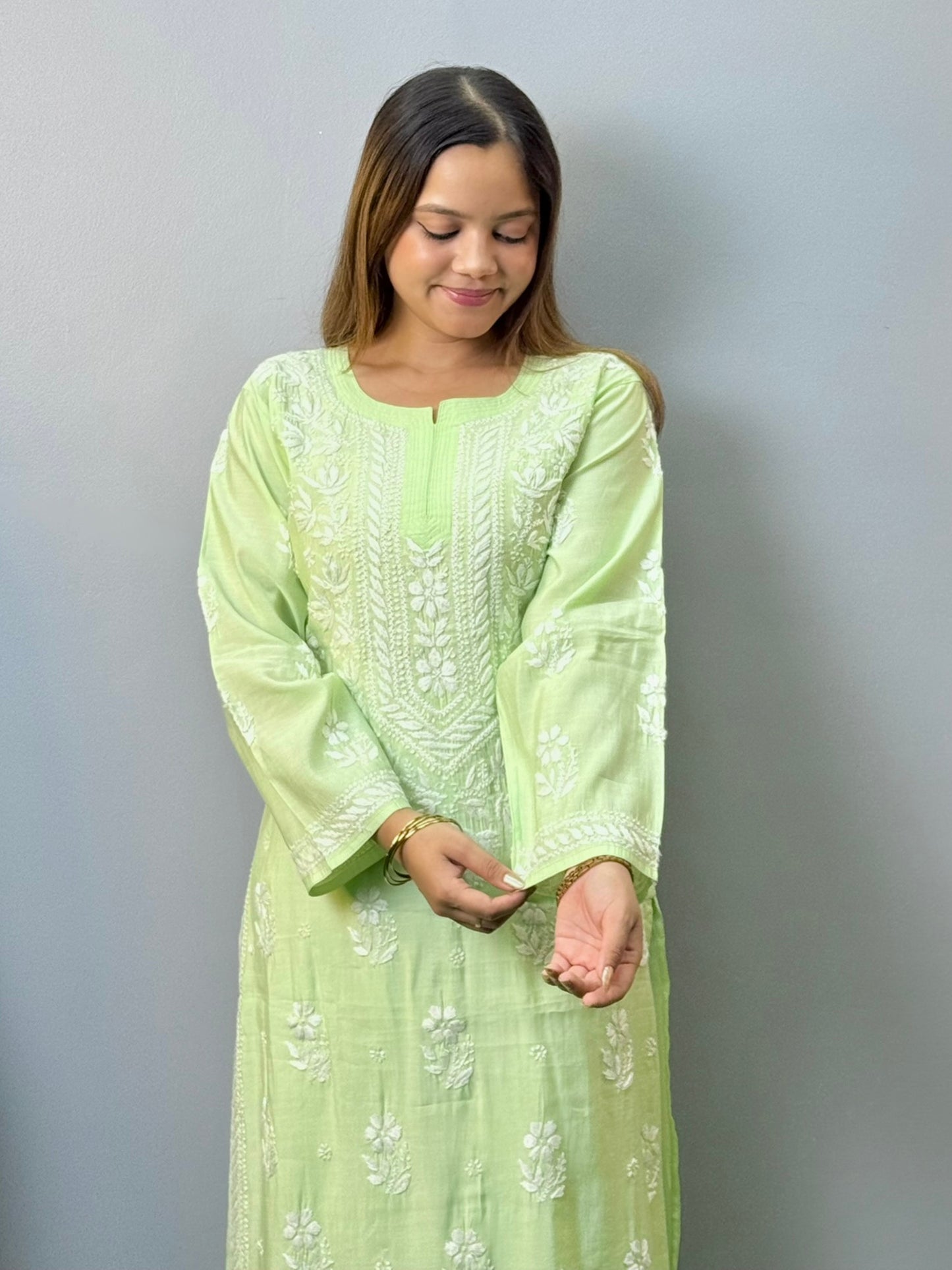 Pastel green chanderi chikankari kurta pant set with delicate white embroidery