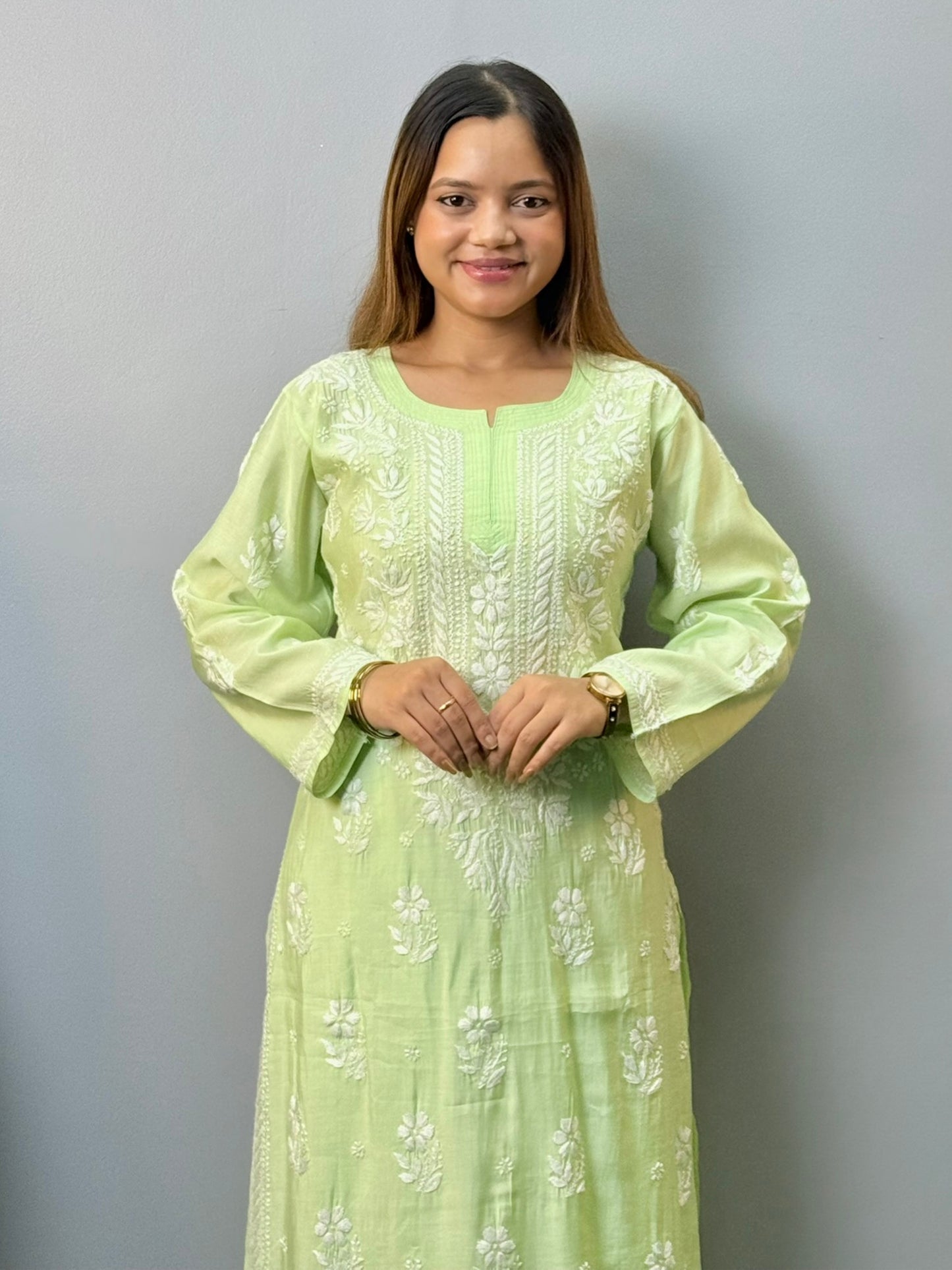 Pastel green chanderi chikankari kurta pant set with delicate white embroidery