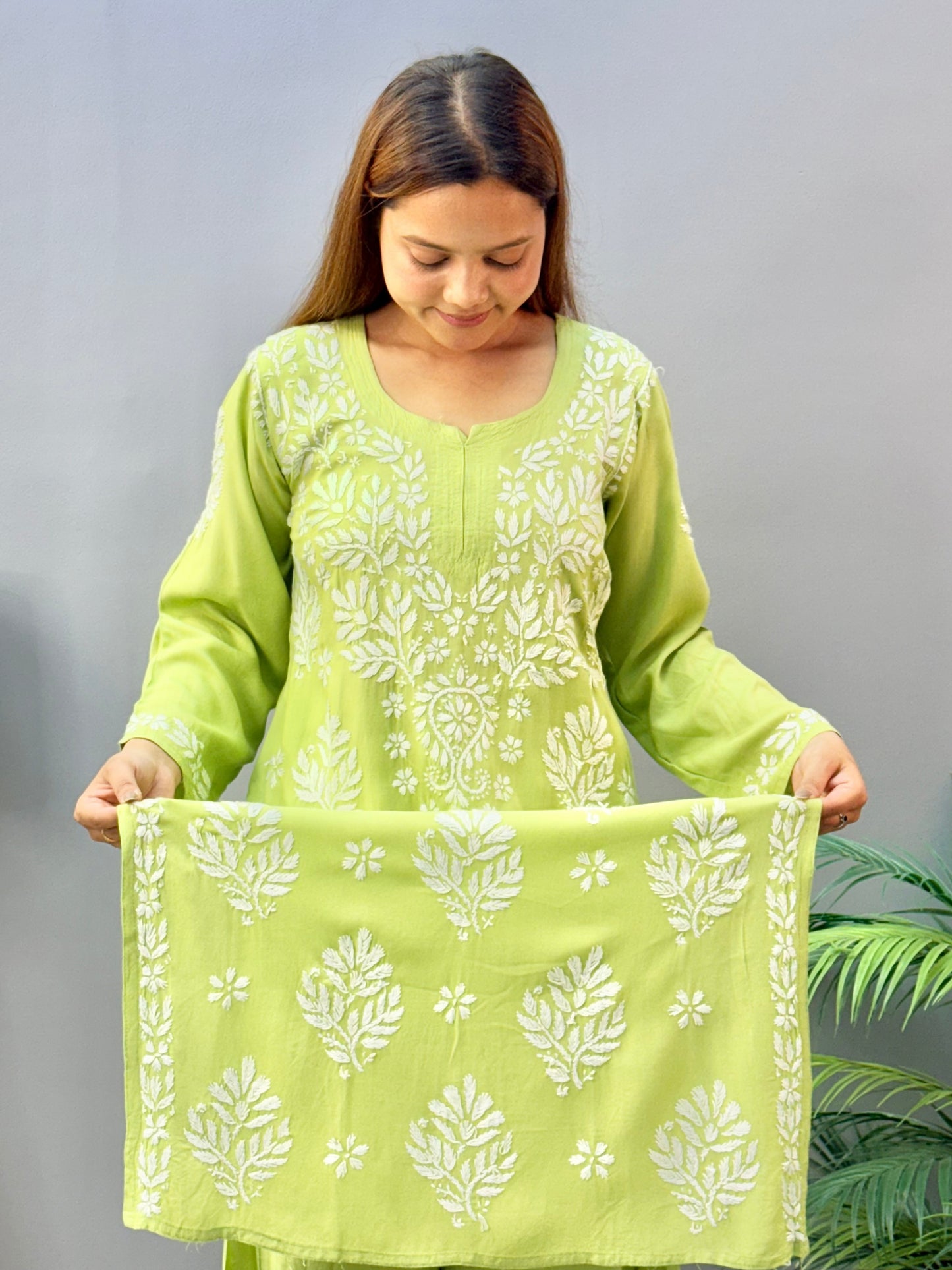 Pista green rayon Lucknow Chikankari kurta and palazzo set with white embroidery