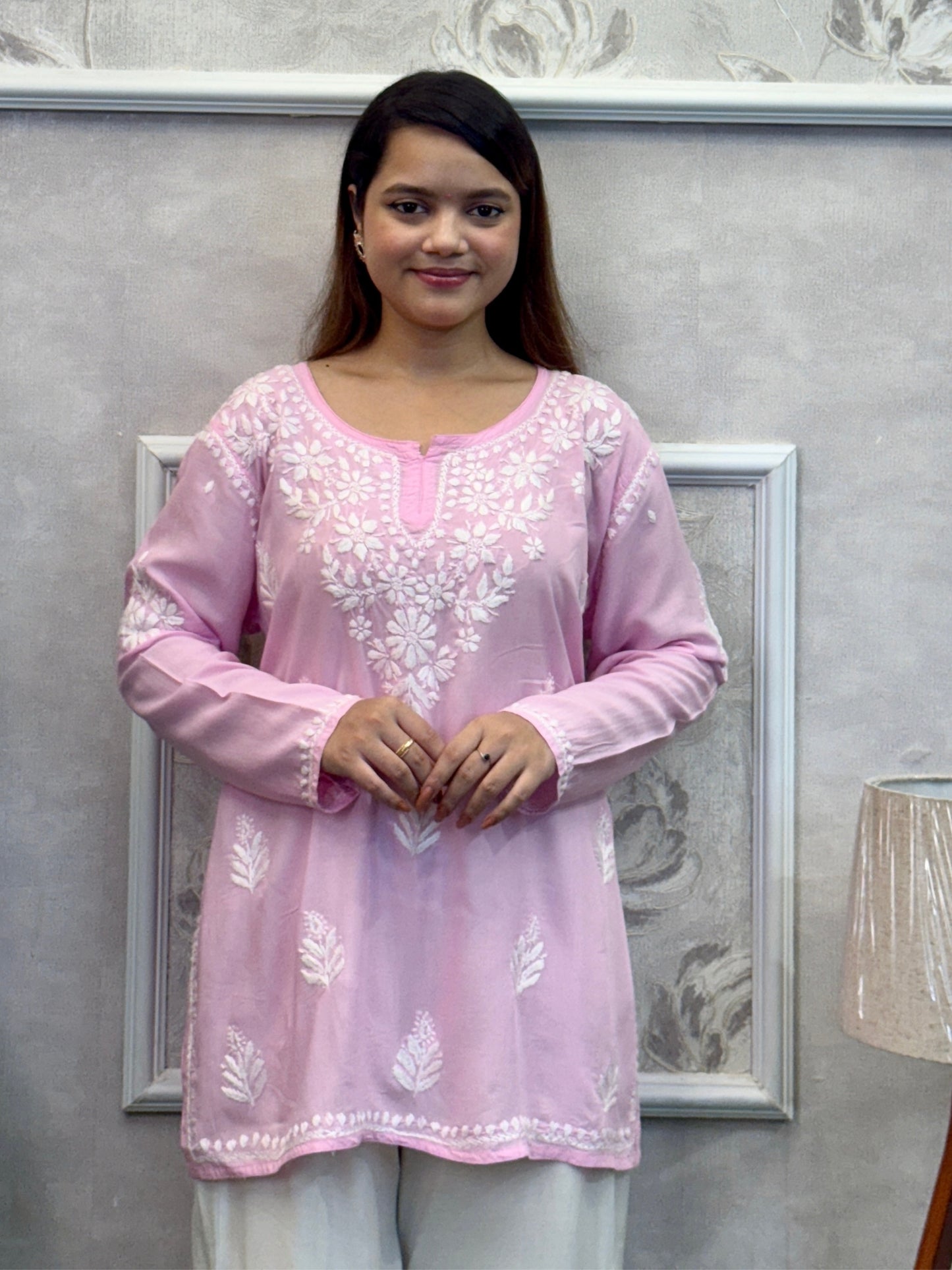 Baby pink Lucknow Chikankari short kurta in modal fabric with hand embroidery.