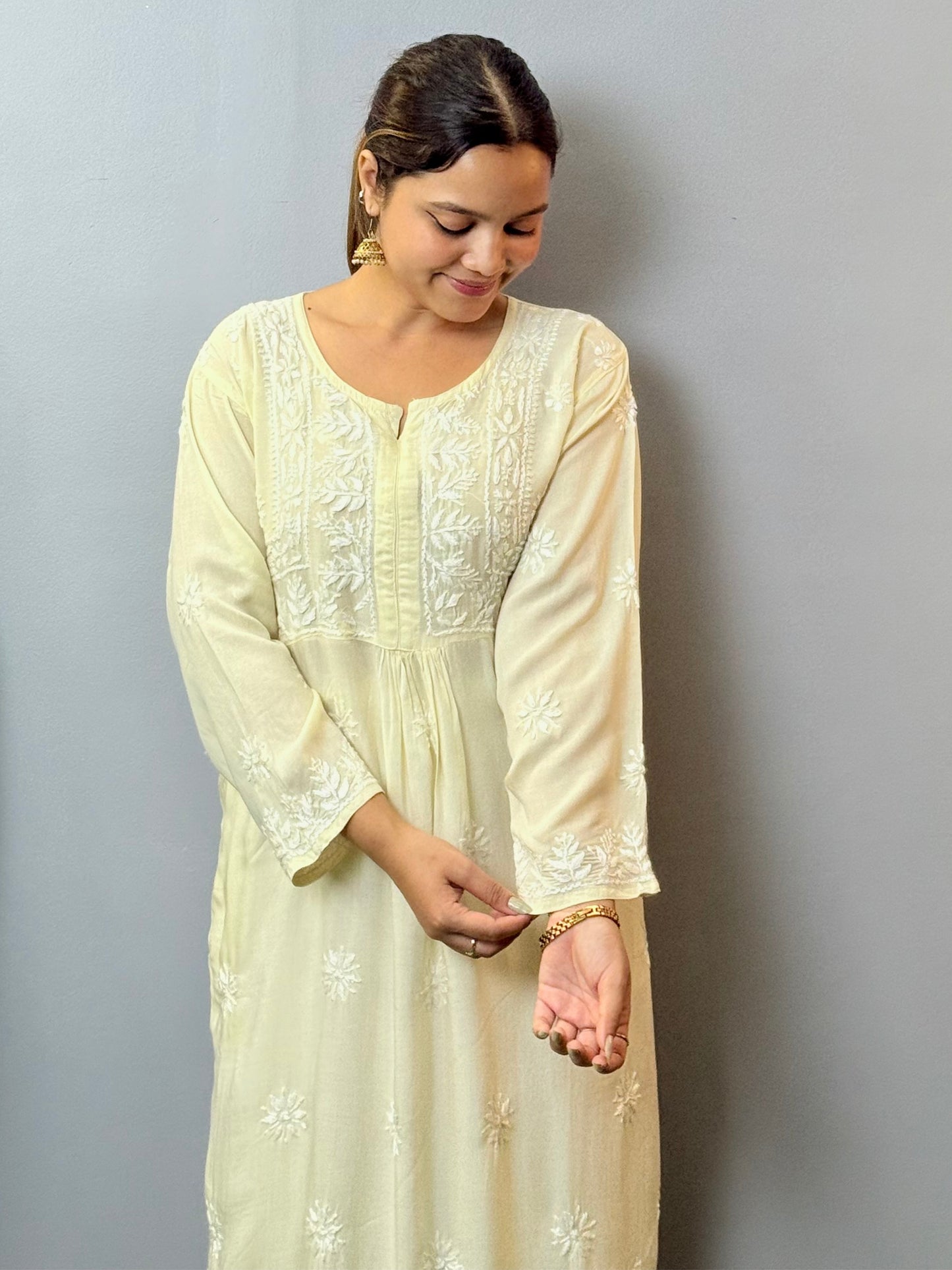Ivory white modal chikankari kurta with hand embroidery and side pockets