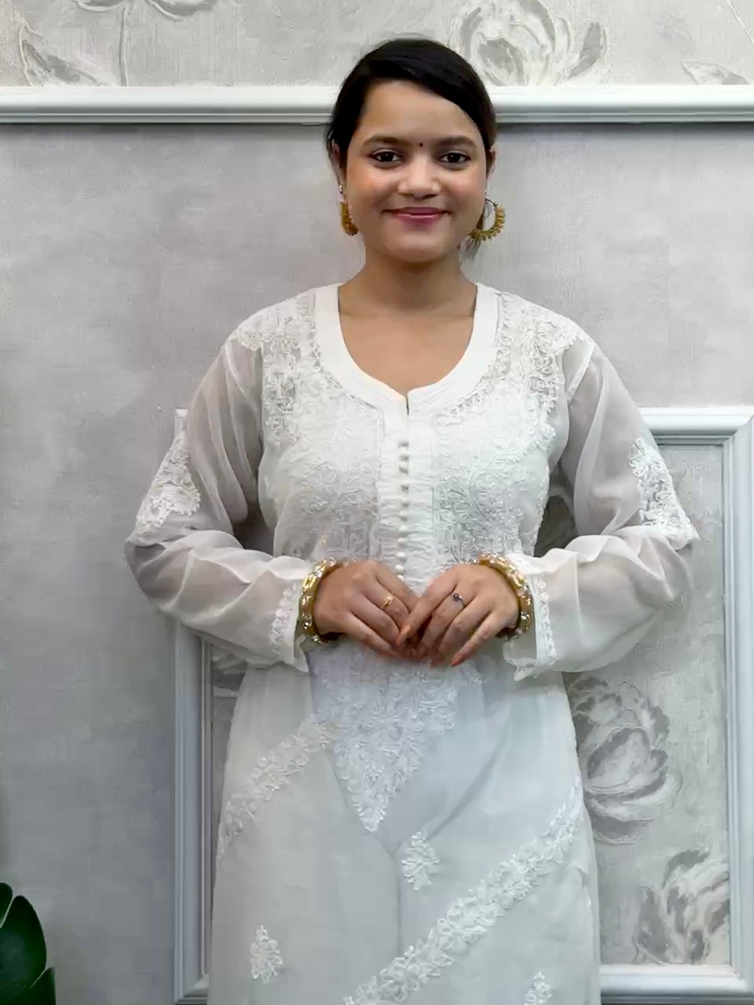 White georgette Lucknow chikankari kurta with delicate hand embroidery, soft and elegant design.