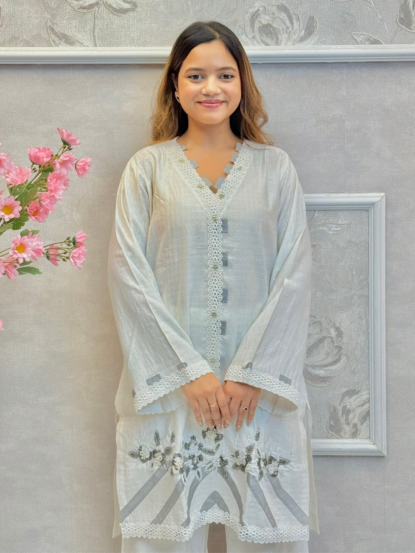 White premium rayon co-ord set featuring handwork on short kurta top with flared palazzo pants – stylish and elegant