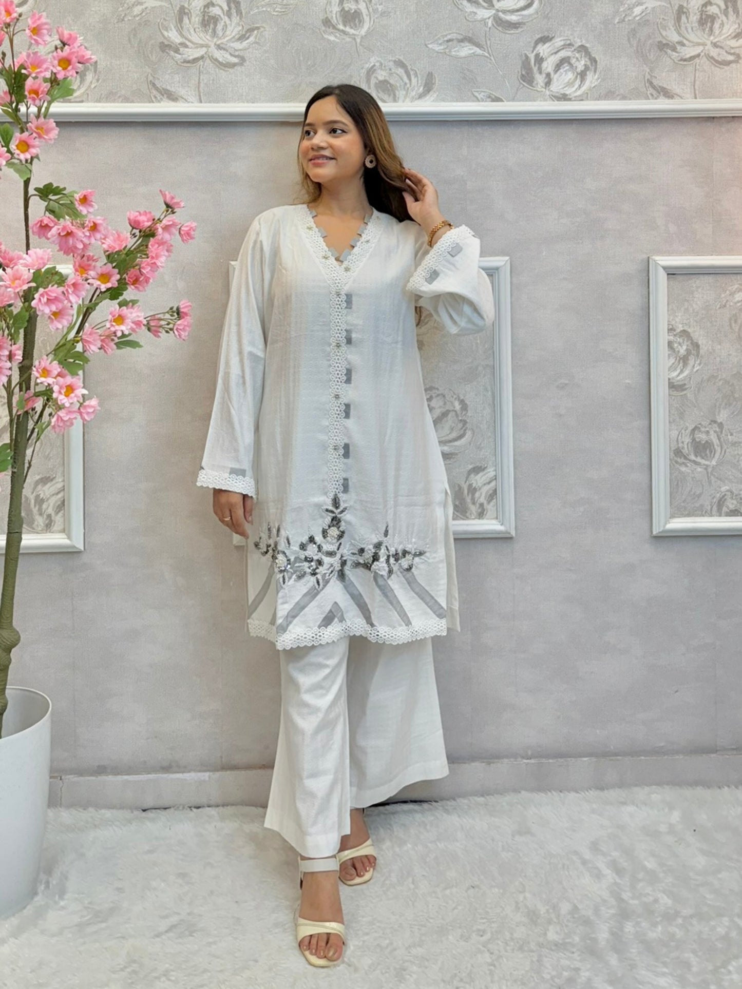 White premium rayon co-ord set featuring handwork on short kurta top with flared palazzo pants – stylish and elegant