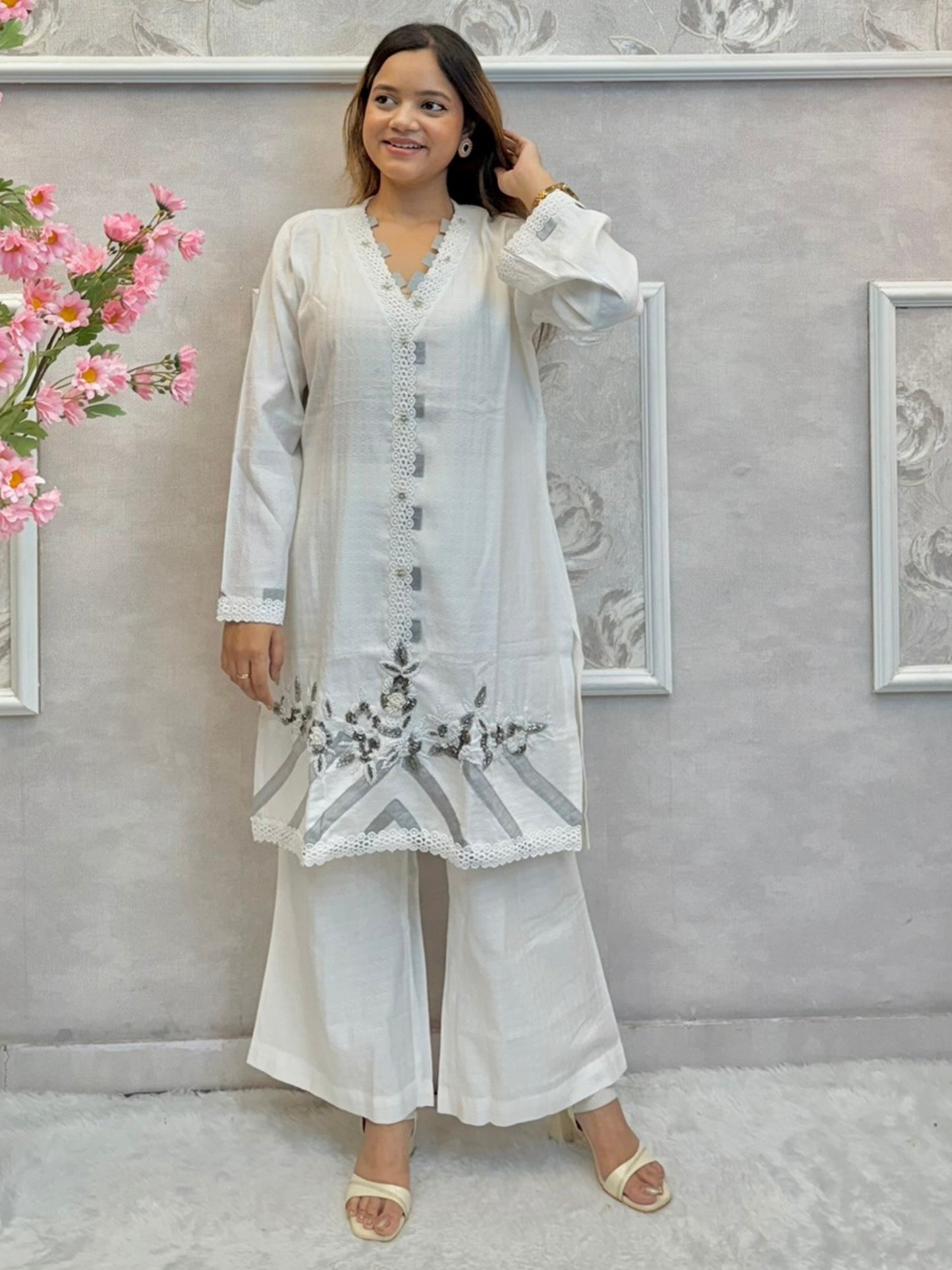 White premium rayon co-ord set featuring handwork on short kurta top with flared palazzo pants – stylish and elegant
