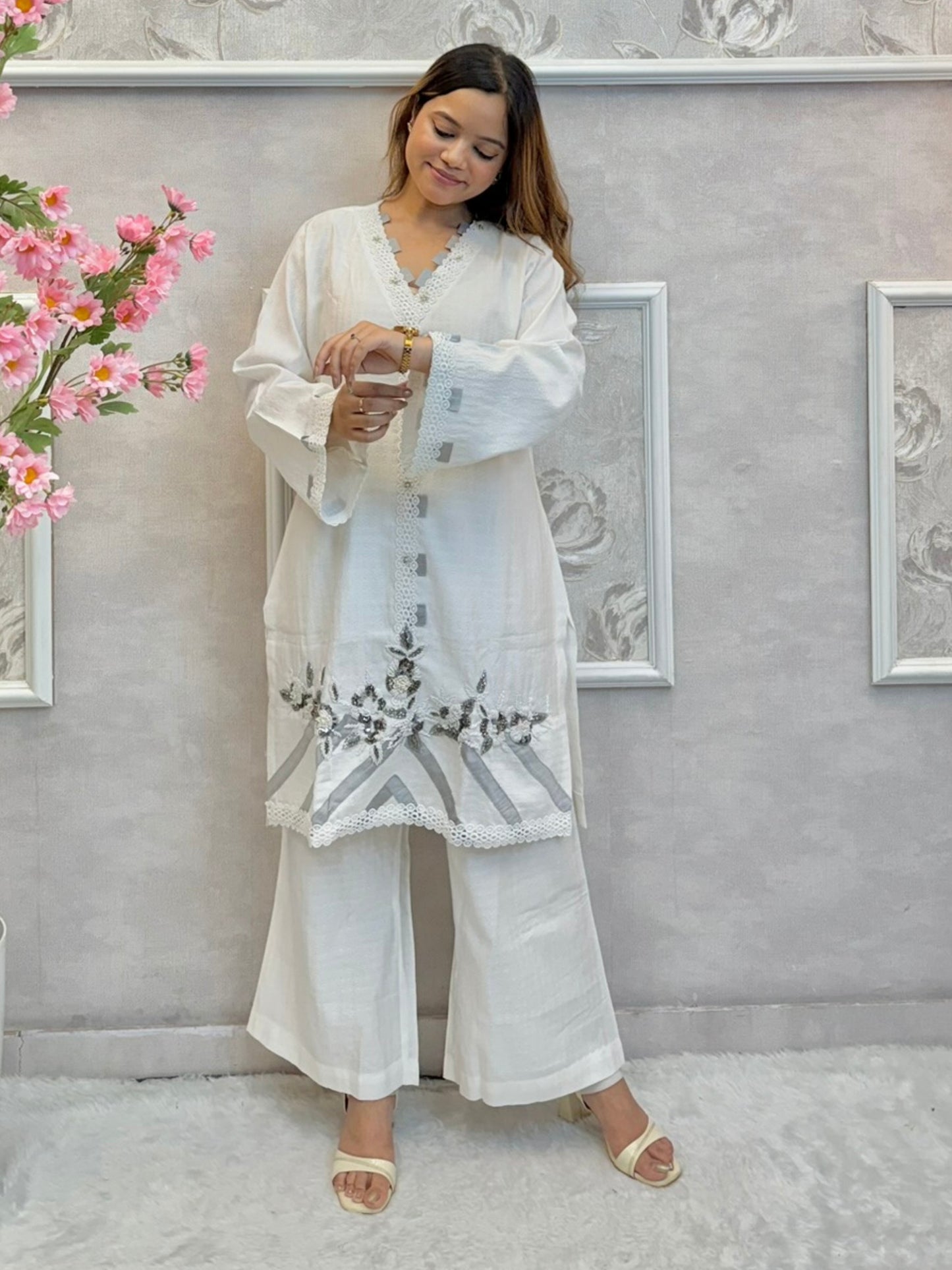 White premium rayon co-ord set featuring handwork on short kurta top with flared palazzo pants – stylish and elegant