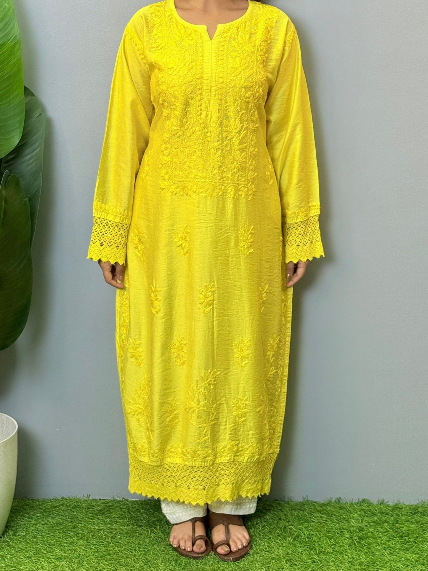 Sunshine yellow chanderi chikankari kurta with hand embroidery and lace detailing