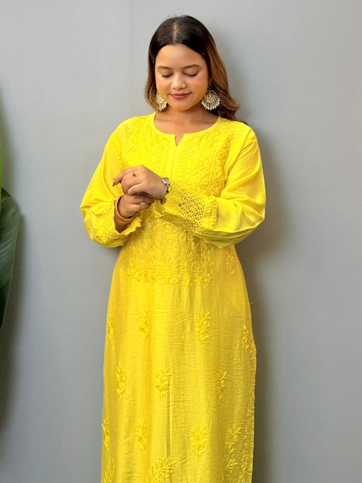 Sunshine yellow chanderi chikankari kurta with hand embroidery and lace detailing