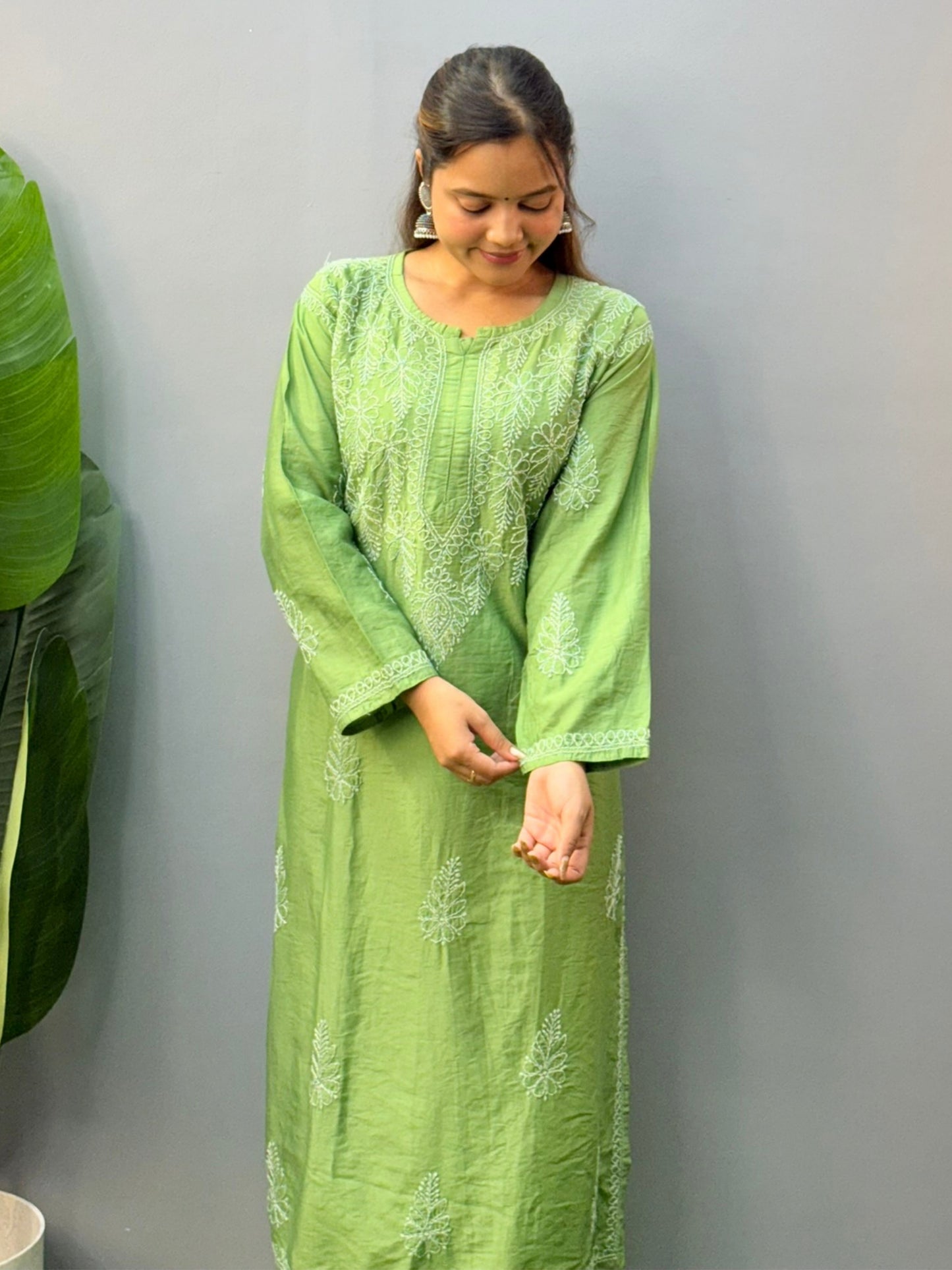 Model wearing leaf green chanderi chikankari kurta with bakhiya hand embroidery