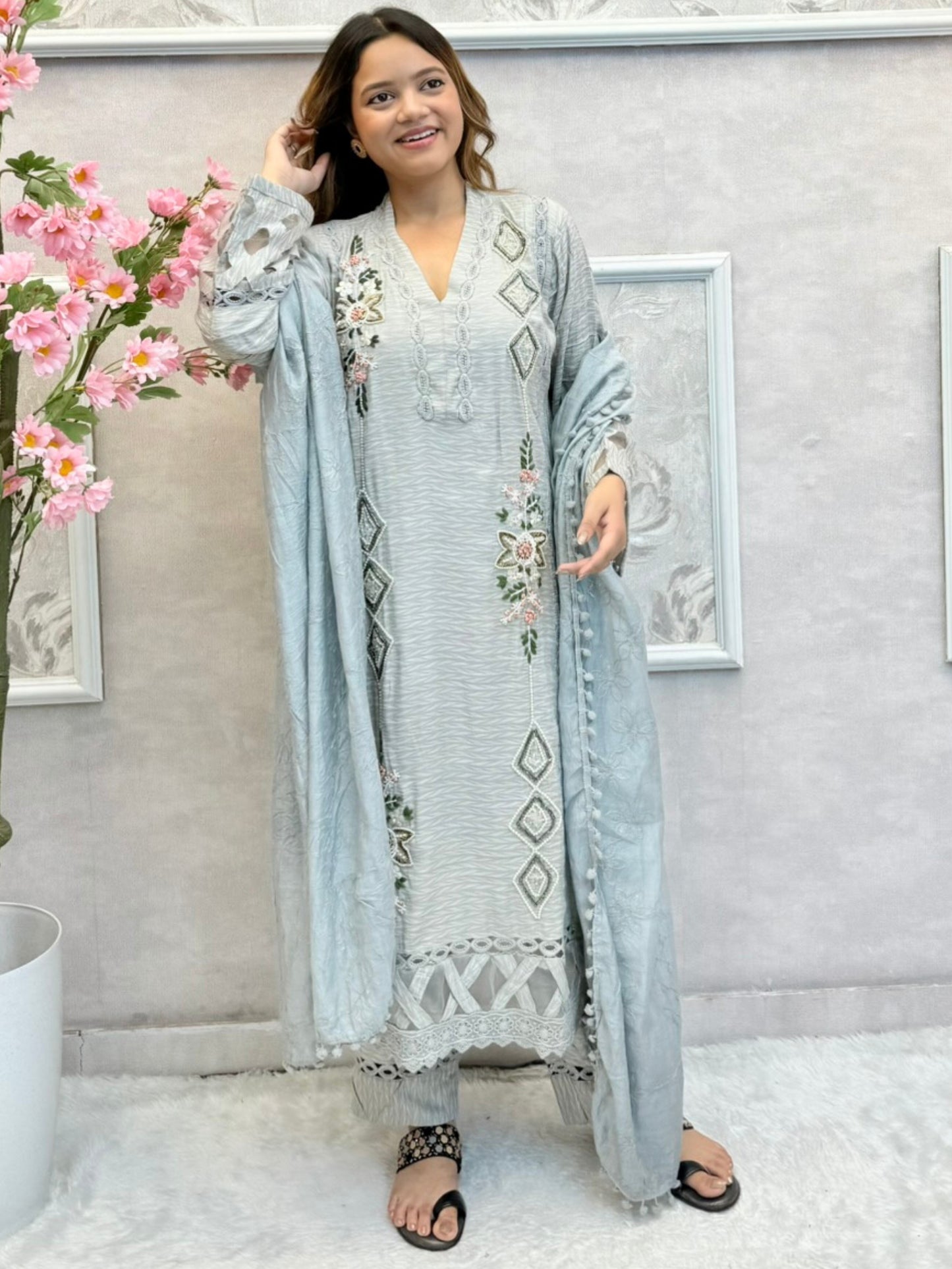 Pastel grey rayon designer suit with handwork kurta, matching pant and chanderi dupatta featuring tassel detailing – stylish and elegant look