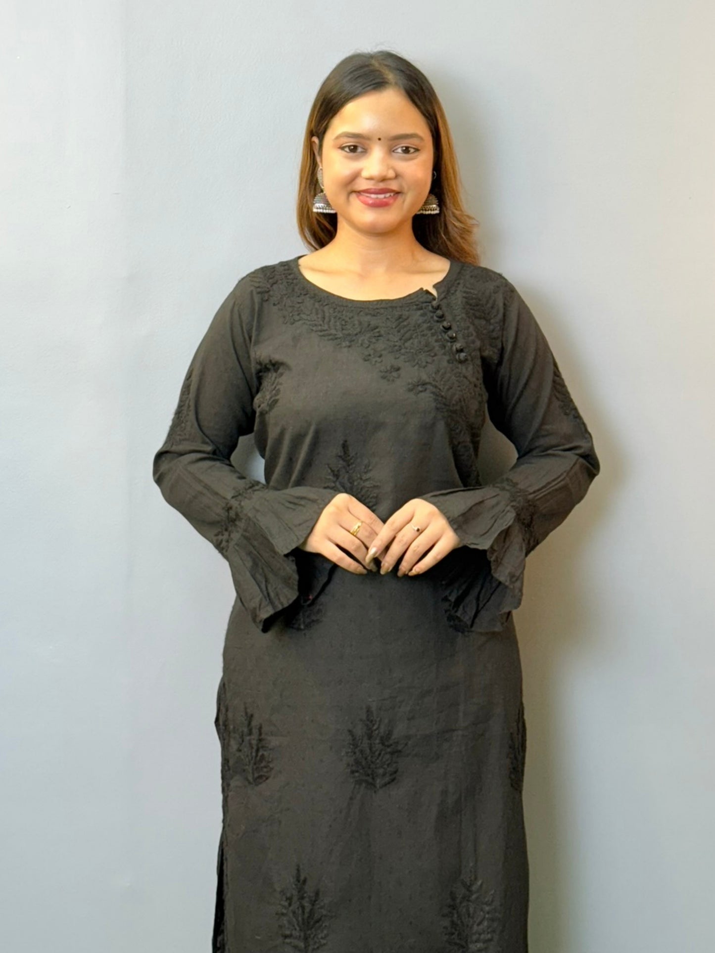 Black dobby cotton chikankari kurta with hand embroidery and bell sleeves