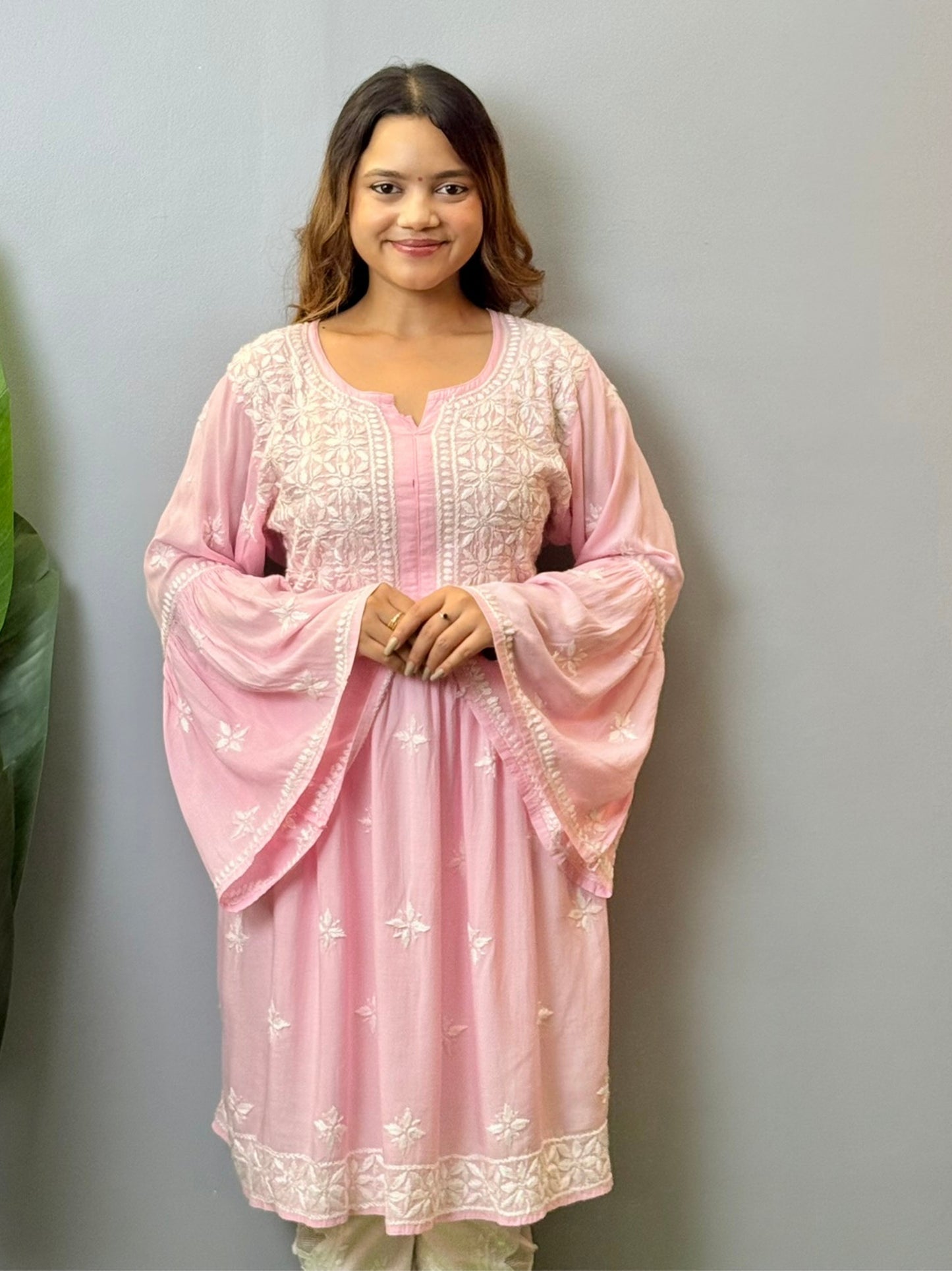 Blush pink modal Lucknowi Chikankari short frock with hand embroidery and bell sleeves, soft and comfortable