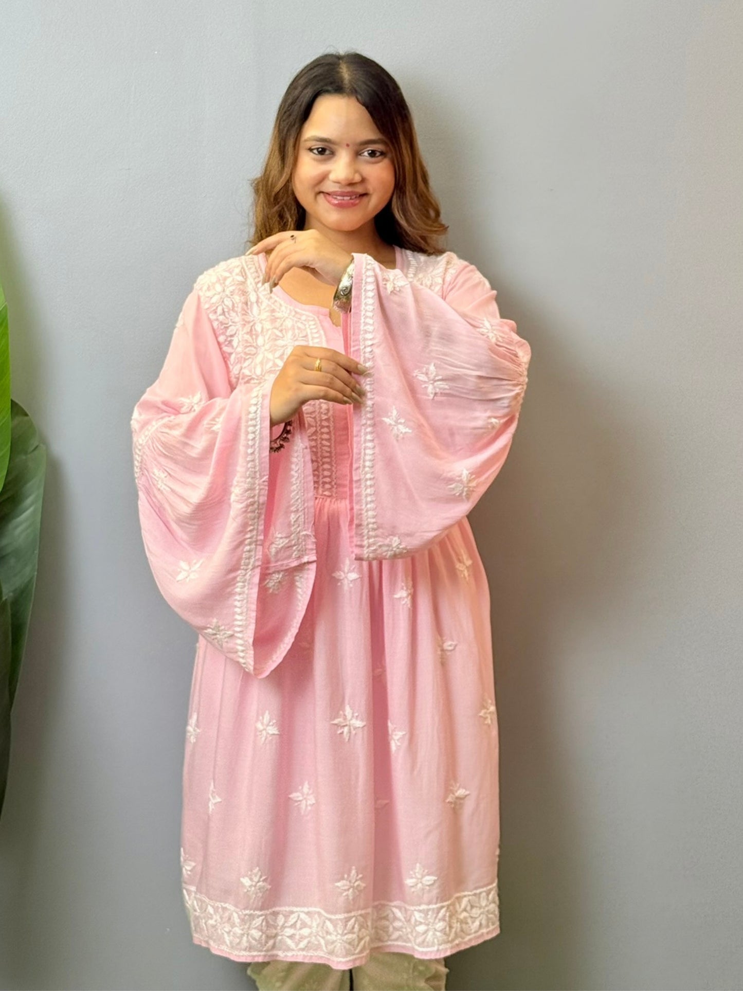 Blush pink modal Lucknowi Chikankari short frock with hand embroidery and bell sleeves, soft and comfortable
