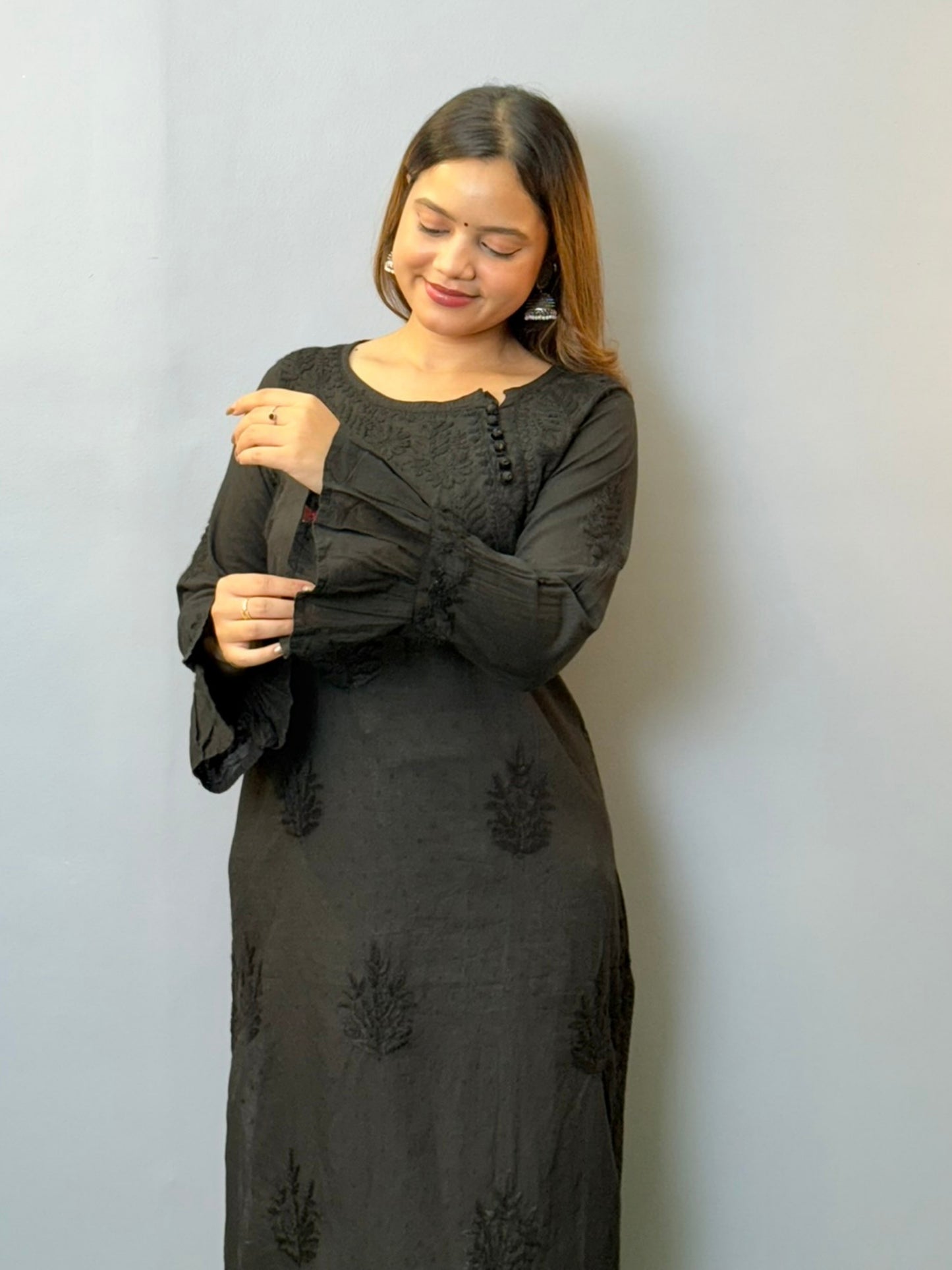 Black dobby cotton chikankari kurta with hand embroidery and bell sleeves