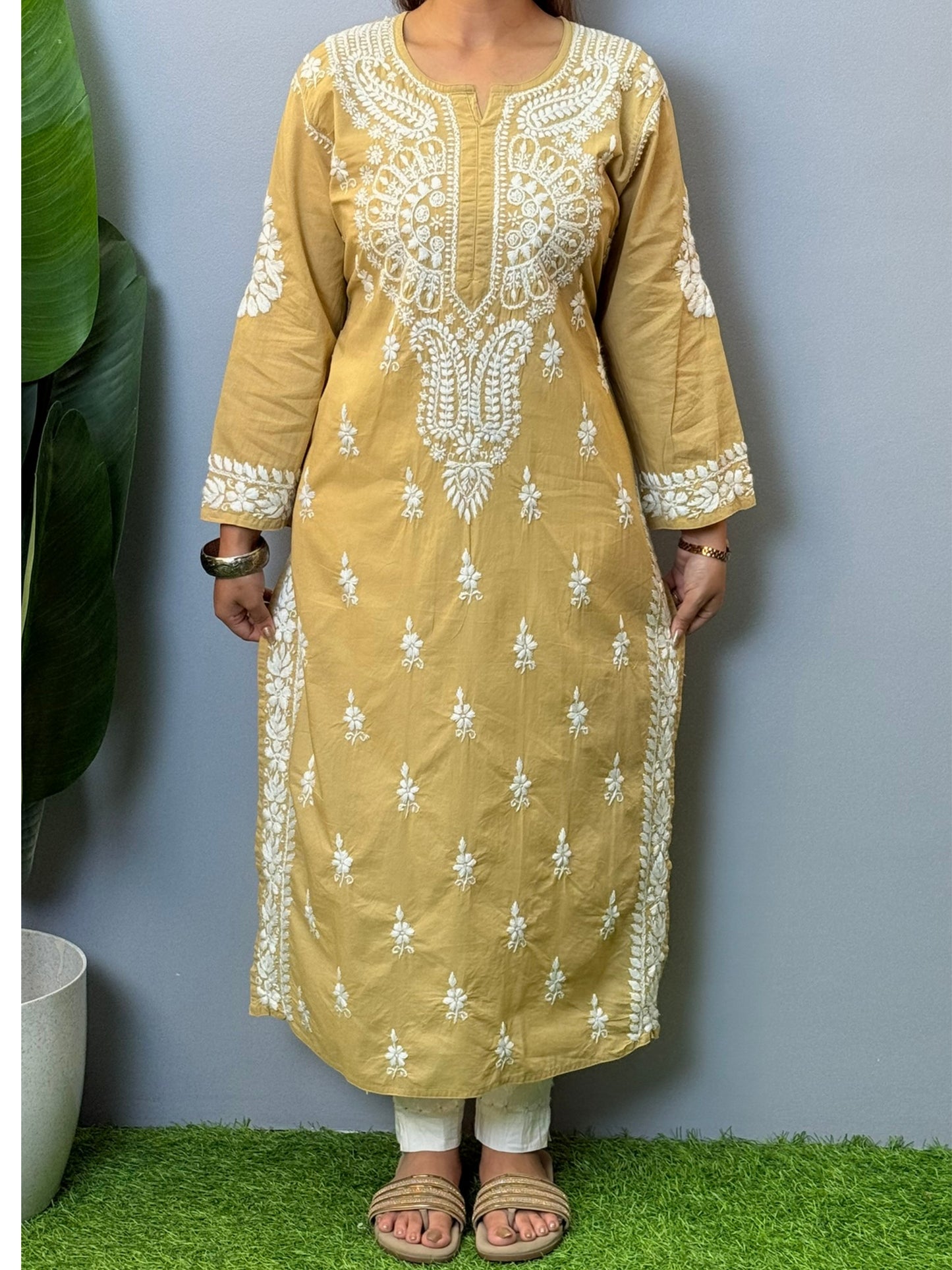 Beige cotton chikankari kurta with hand embroidery and elegant ethnic design