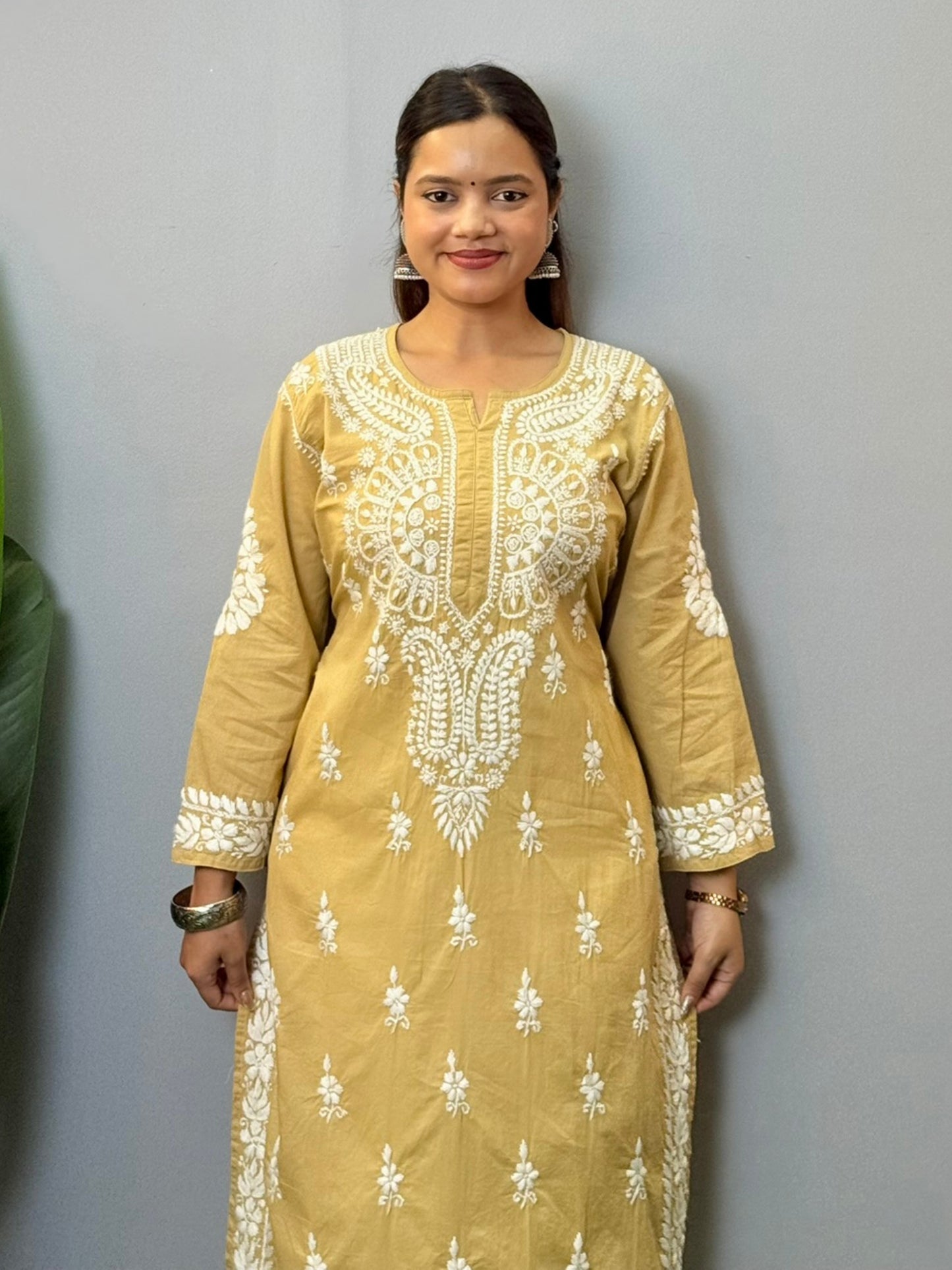 Beige cotton chikankari kurta with hand embroidery and elegant ethnic design