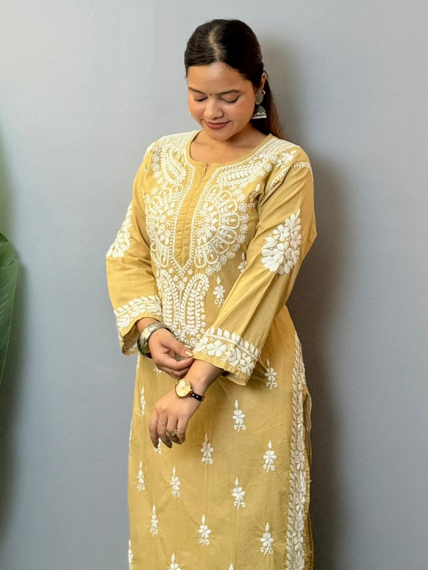 Beige cotton chikankari kurta with hand embroidery and elegant ethnic design