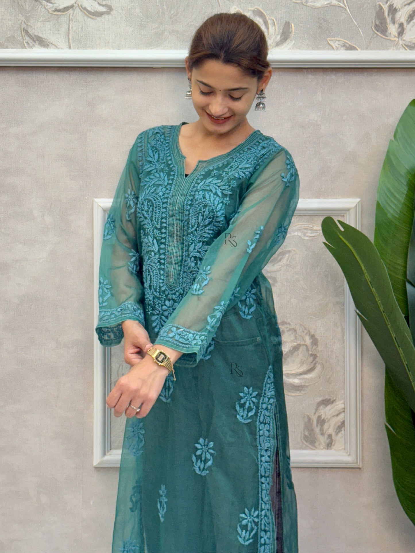 Teal blue organza Lucknow Chikankari kurta with hand embroidery.