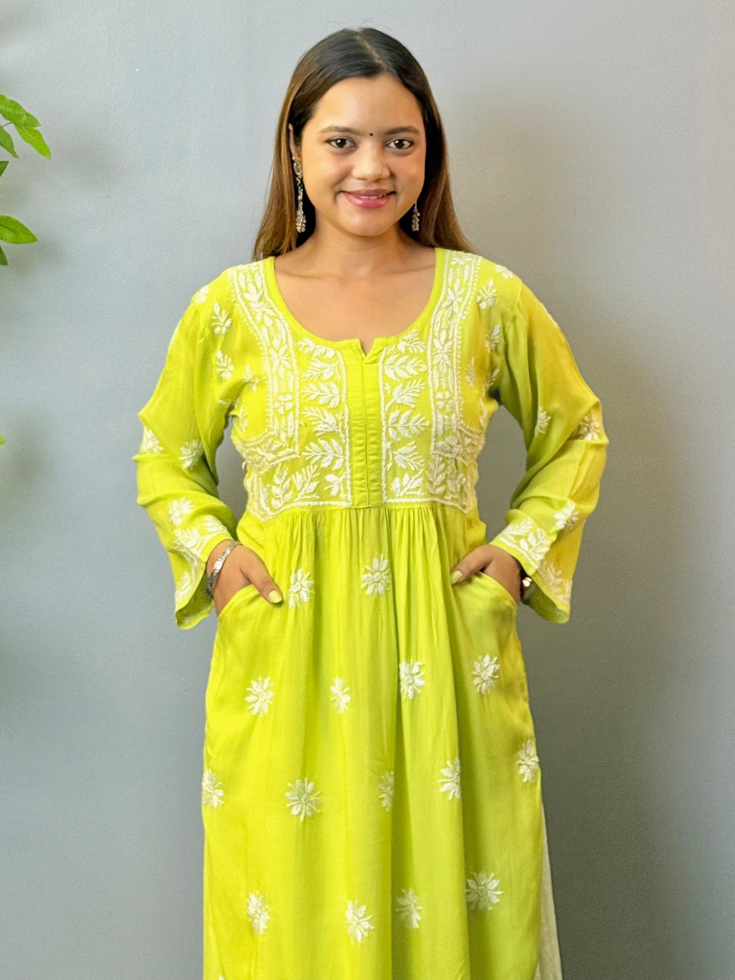 Lime green modal chikankari kurta with hand embroidery and pocket design