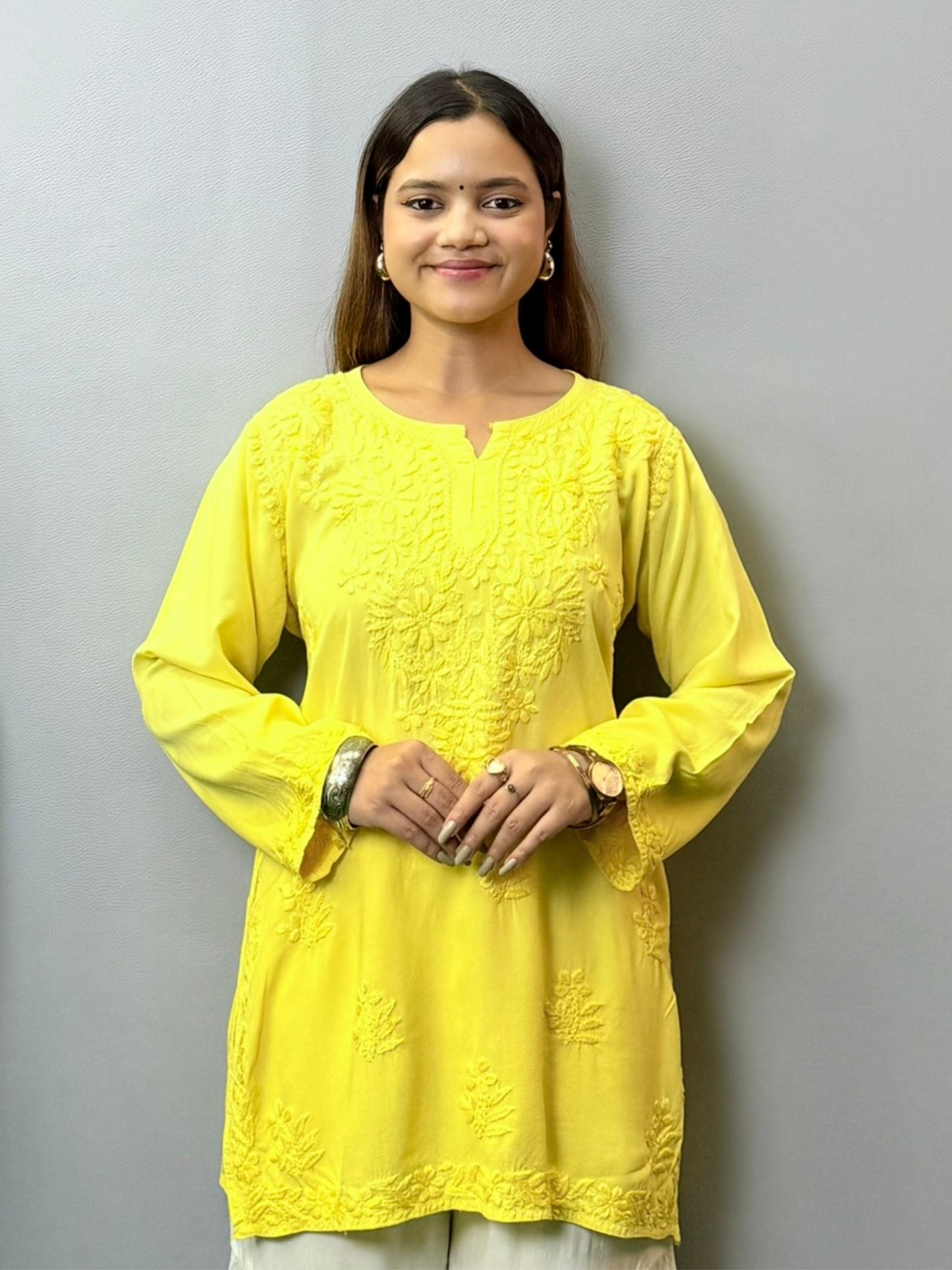 Sunshine yellow rayon short kurta with white hand embroidery in Lucknow Chikankari style
