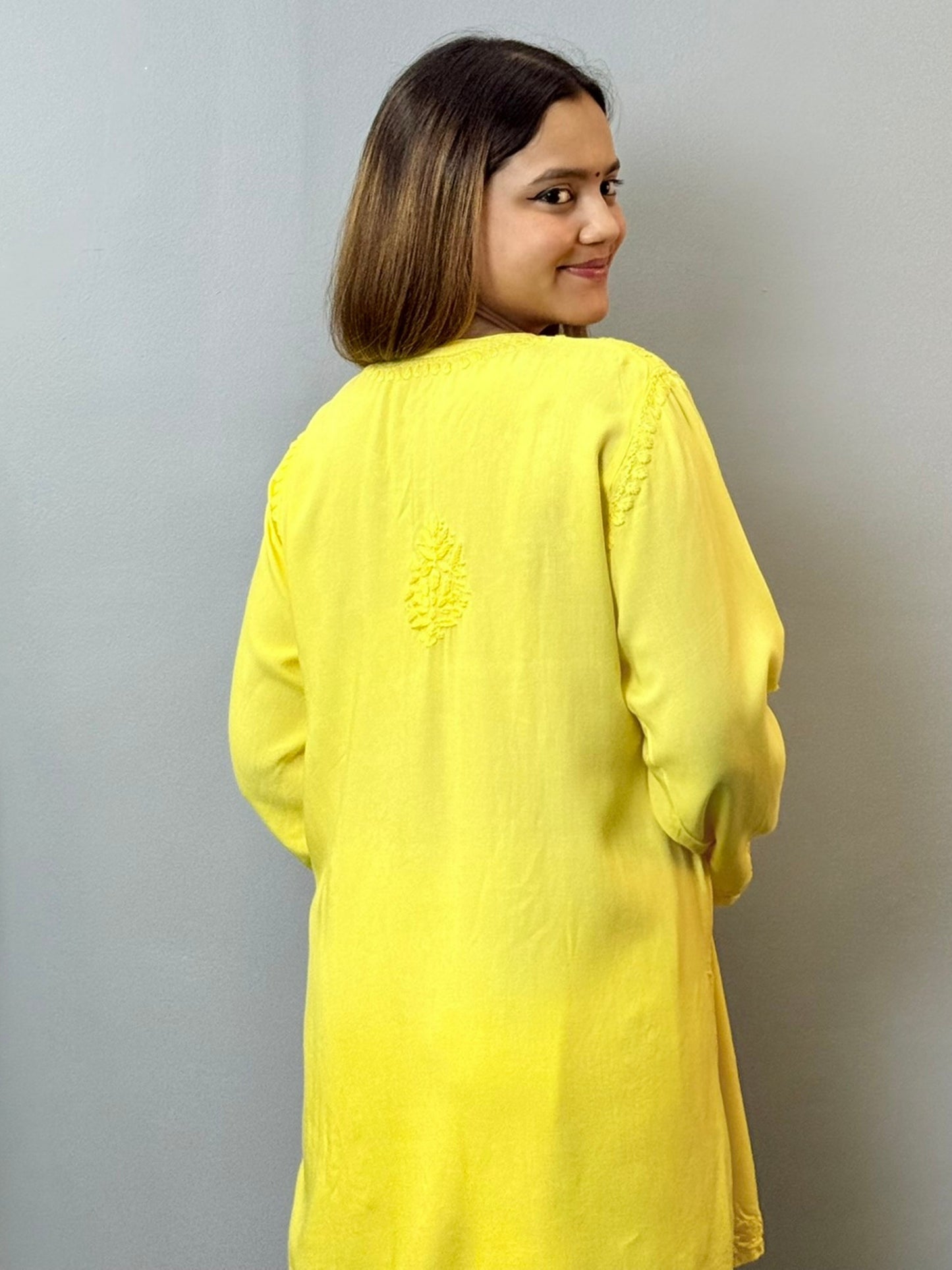 Sunshine yellow rayon short kurta with white hand embroidery in Lucknow Chikankari style