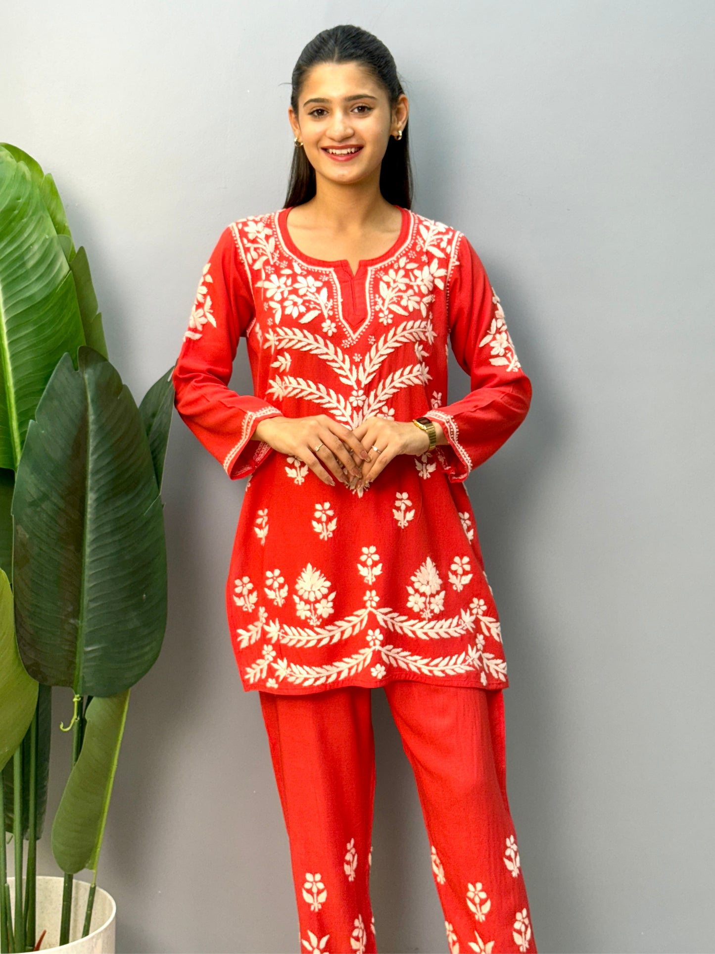 Red rayon chikankari short kurta and pant set with printed design and hand embroidery