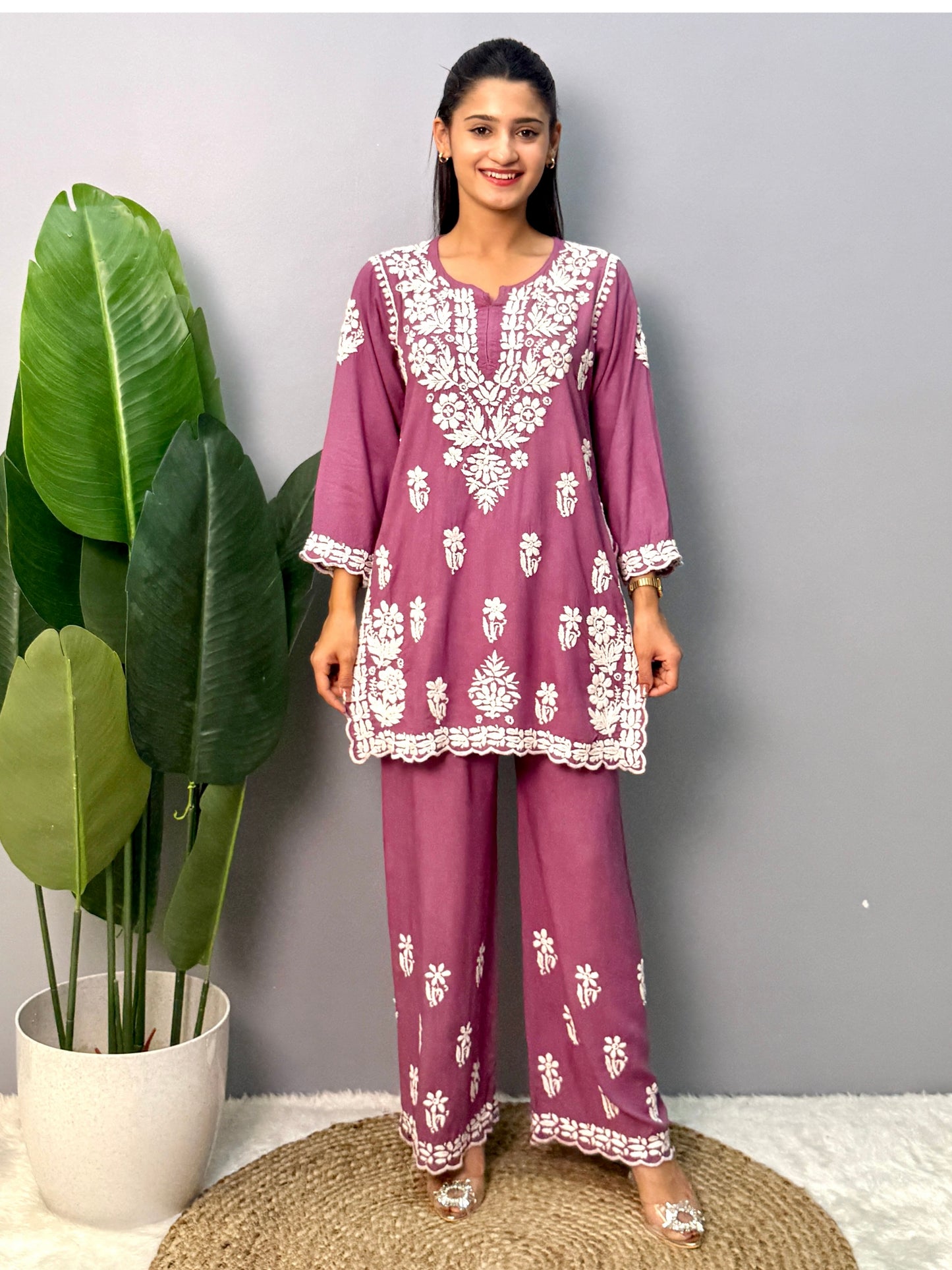Mauve rayon short kurta with matching palazzo pants featuring authentic Lucknow Chikankari hand embroidery.