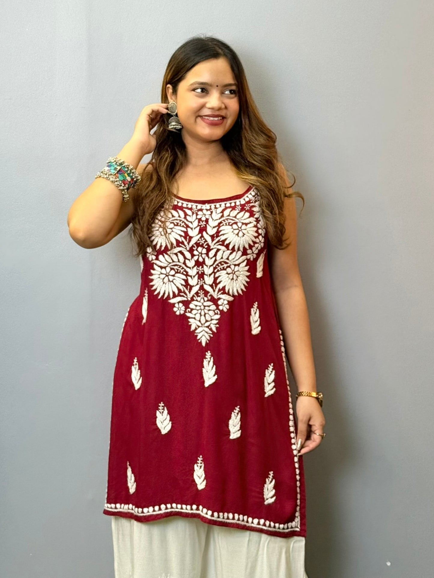 Maroon sleeveless rayon Lucknowi Chikankari short kurta with white hand embroidery