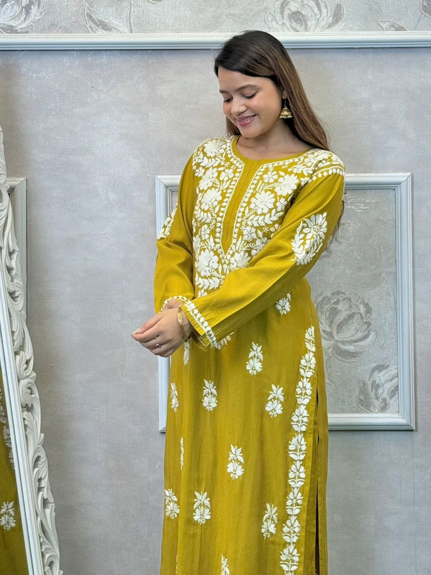 Mustard yellow Norway silk Lucknowi Chikankari kurta and pant set with intricate white hand embroidery