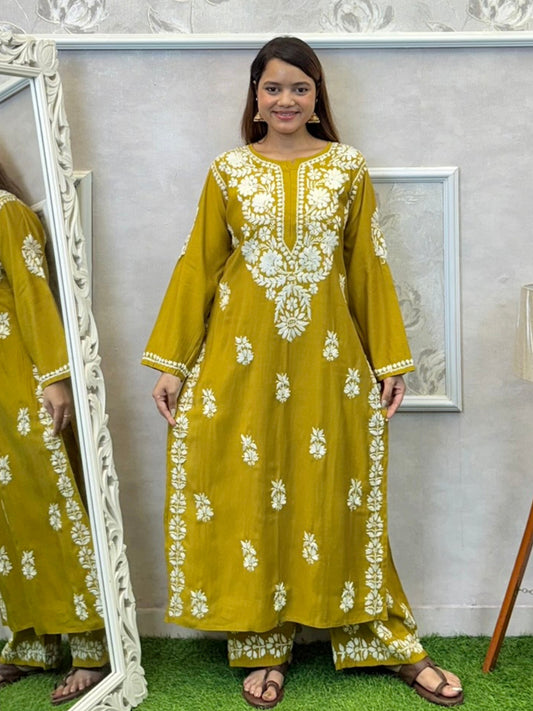 Mustard yellow Norway silk Lucknowi Chikankari kurta and pant set with intricate white hand embroidery