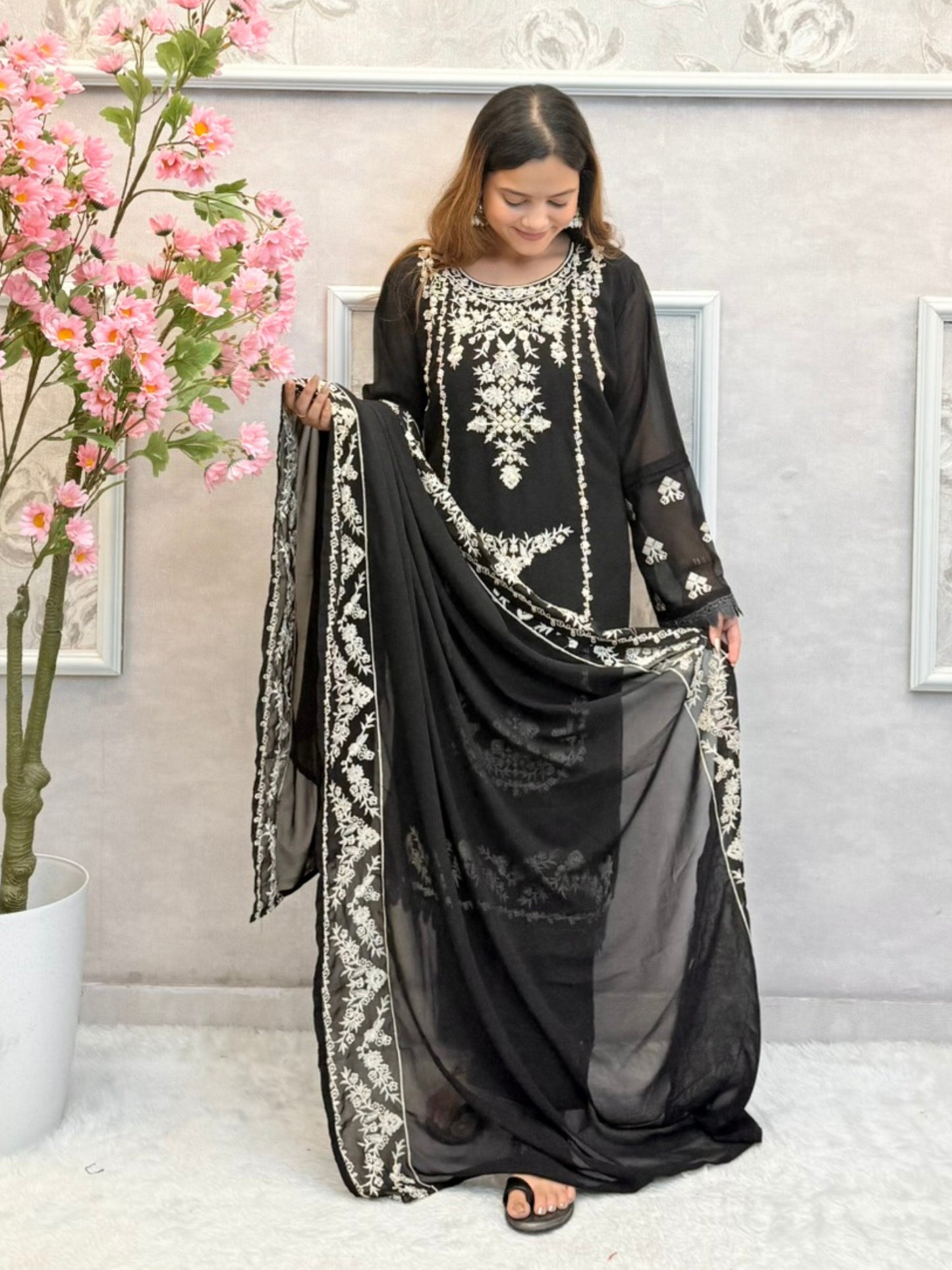 Black georgette designer kurta set with ivory hand embroidery and matching dupatta
