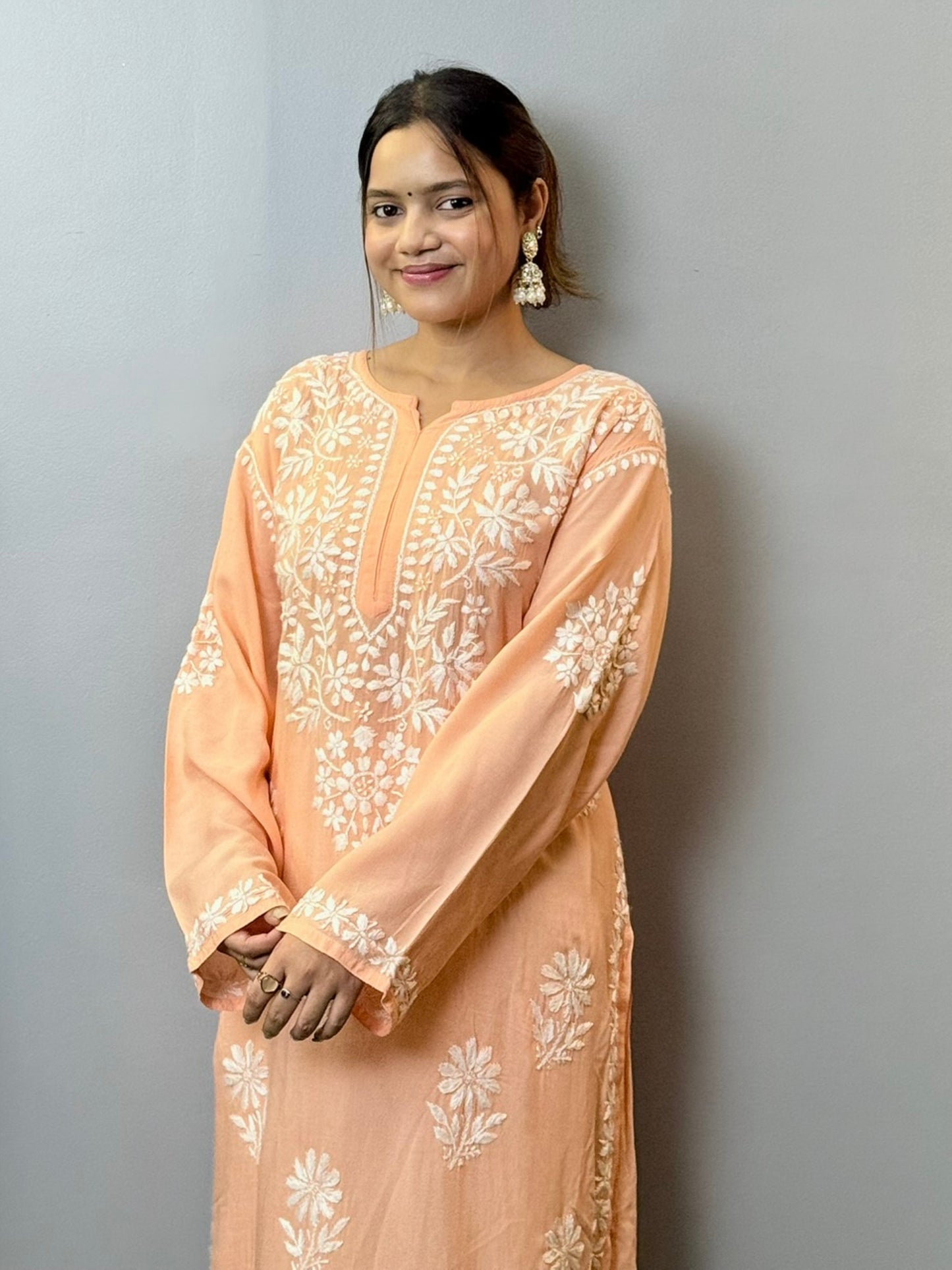 Peach modal Lucknowi Chikankari kurta with white hand embroidery, ideal for casual summer wear