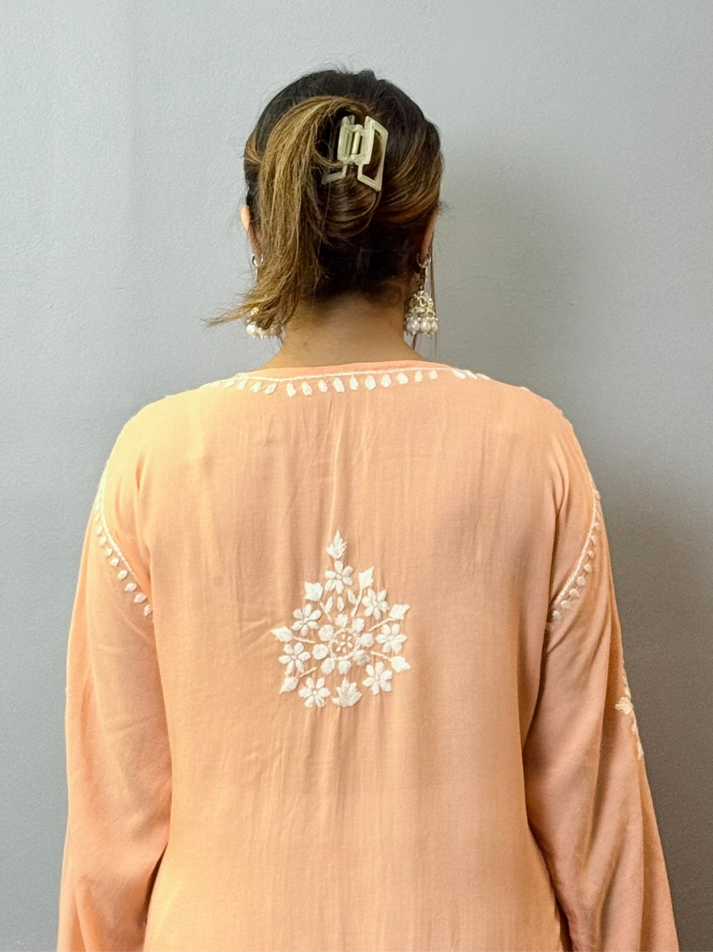 Peach modal Lucknowi Chikankari kurta with white hand embroidery, ideal for casual summer wear