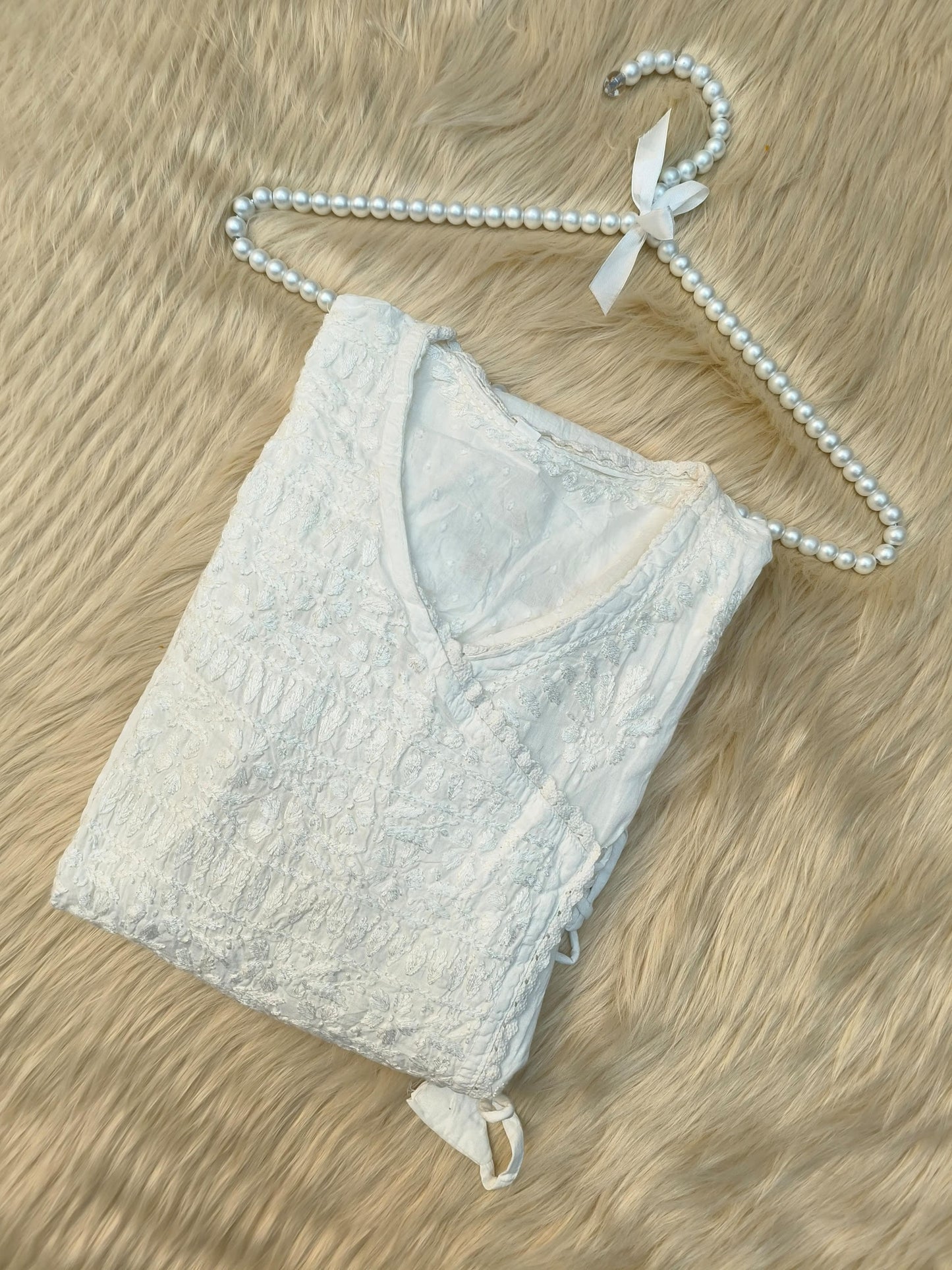 White dobby cotton angrakha chikankari kurta with side tie and hand embroidery