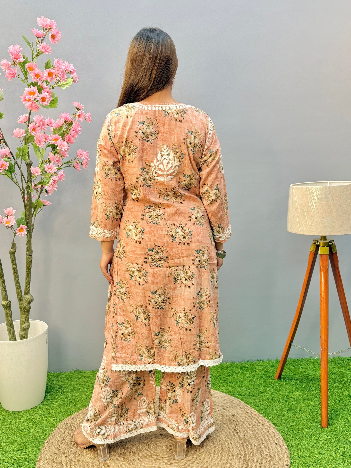 Warm peach printed Lucknow Chikankari mulmul kurta palazzo set with lace detailing