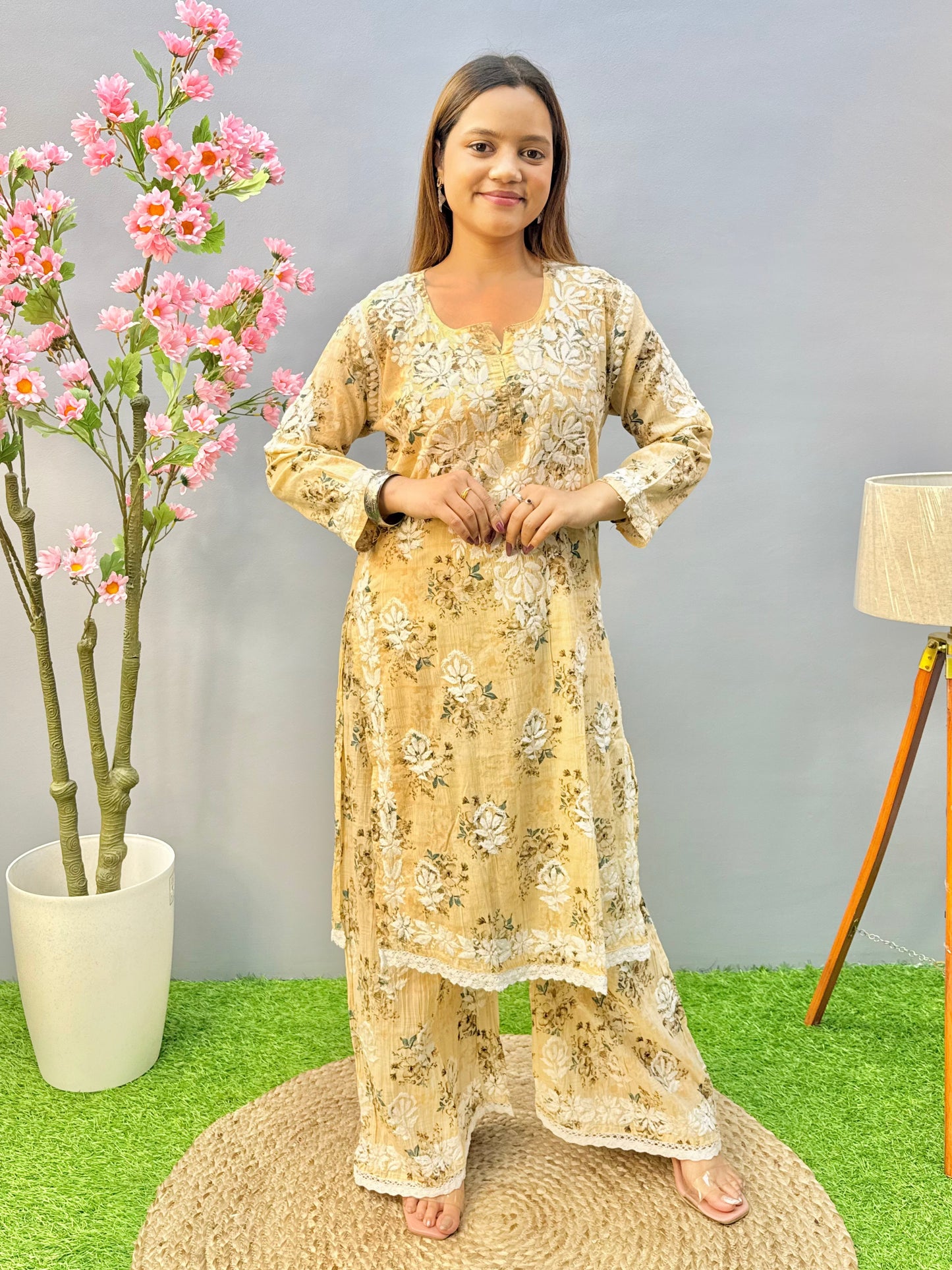 Beige floral mulmul chikankari kurta and palazzo set with lace detailing