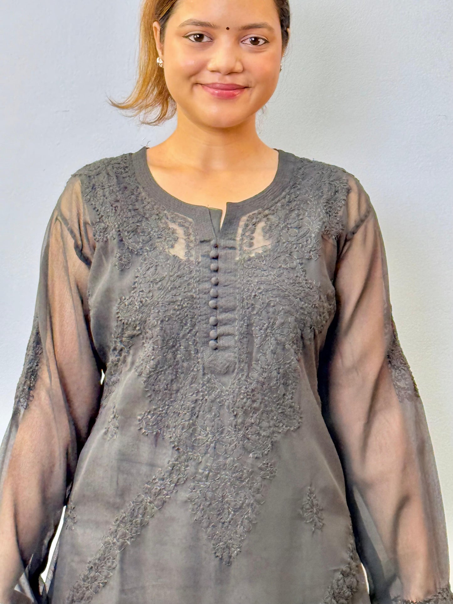 Black sheer georgette chikankari kurta with hand embroidery and straight fit