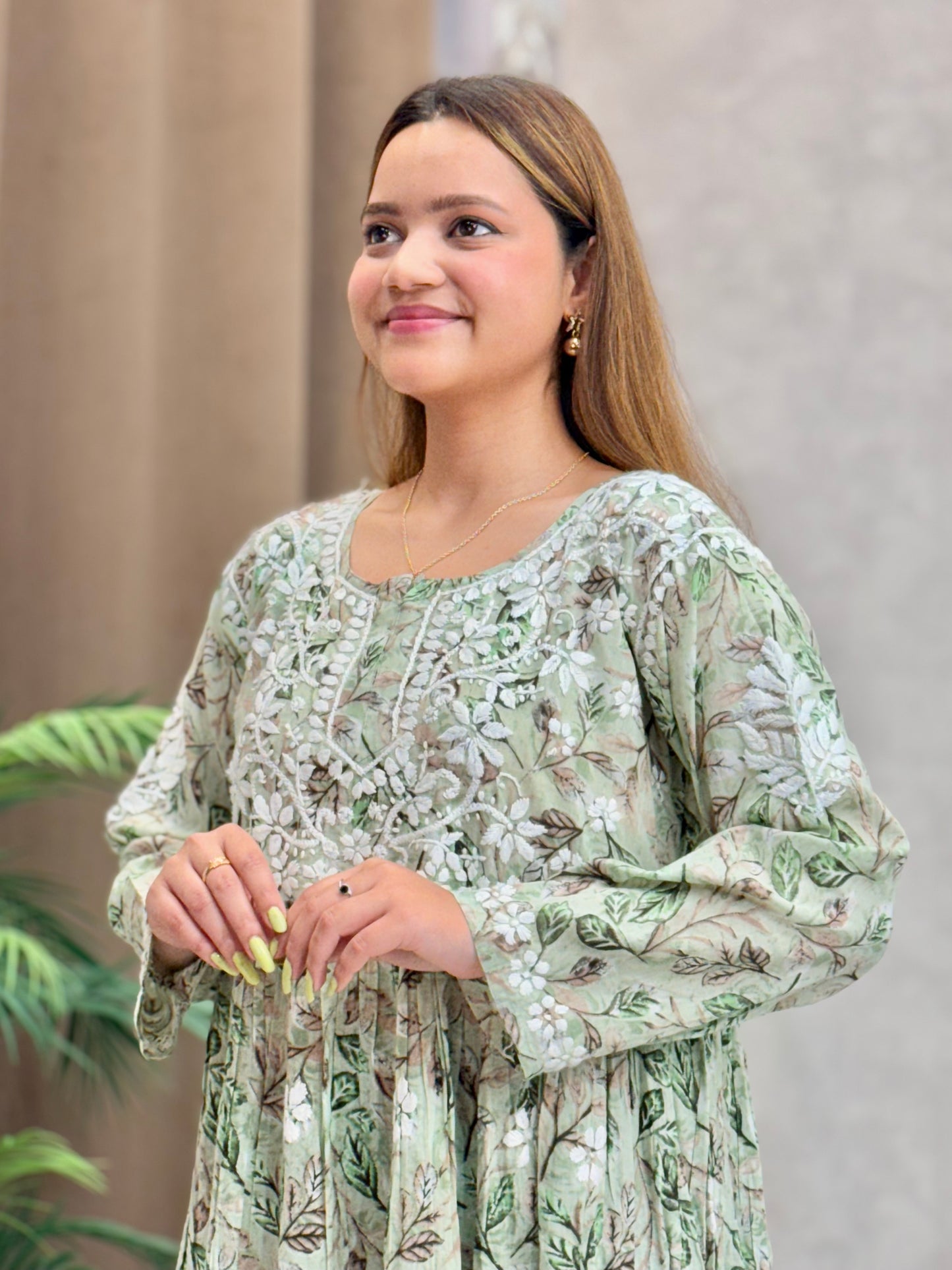 Sage green printed mulmul frock kurta with flared silhouette and Lucknow Chikankari embroidery
