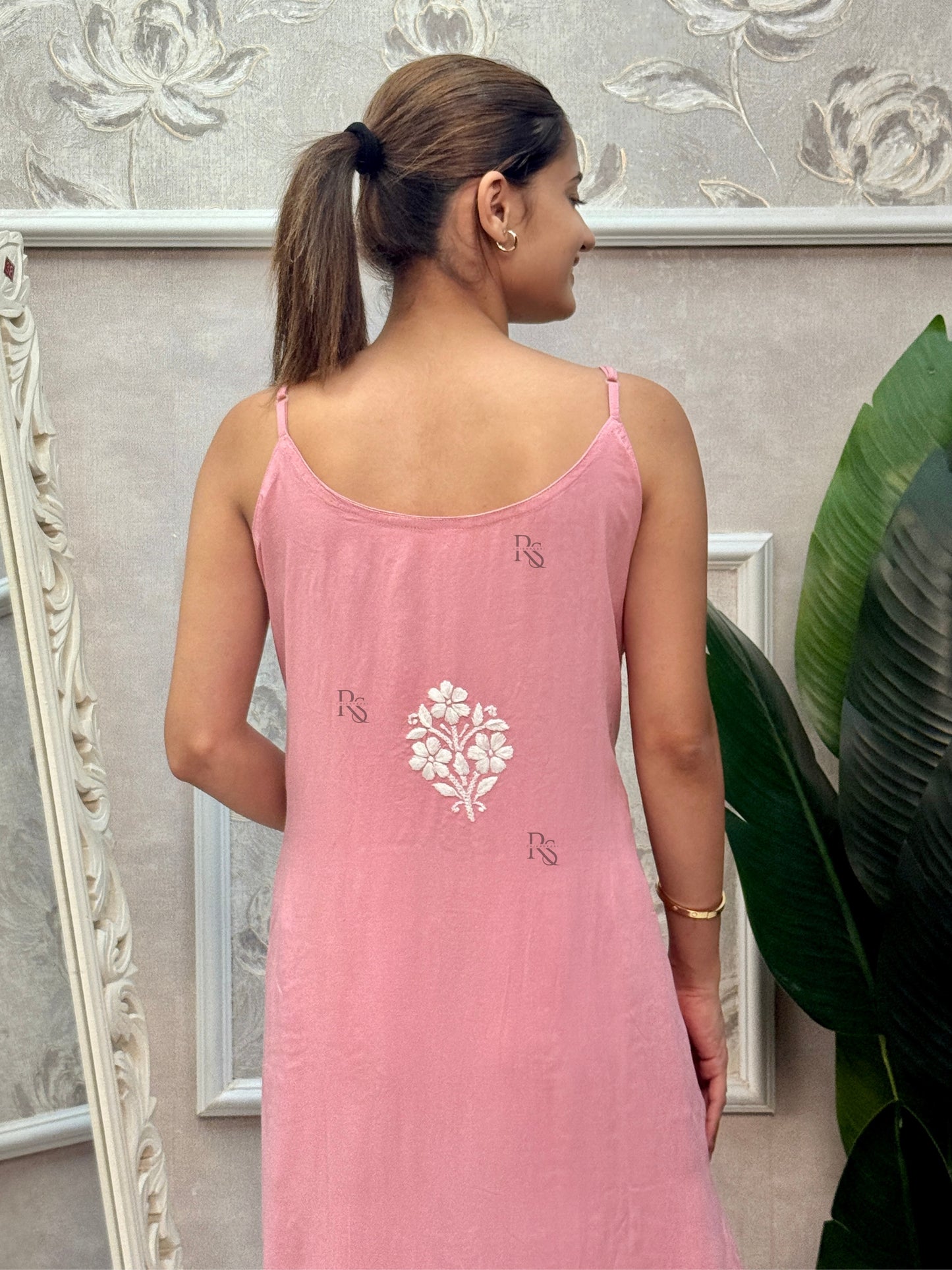 Pink sleeveless Lucknow Chikankari kurta and pant set with hand embroidery in rayon fabric