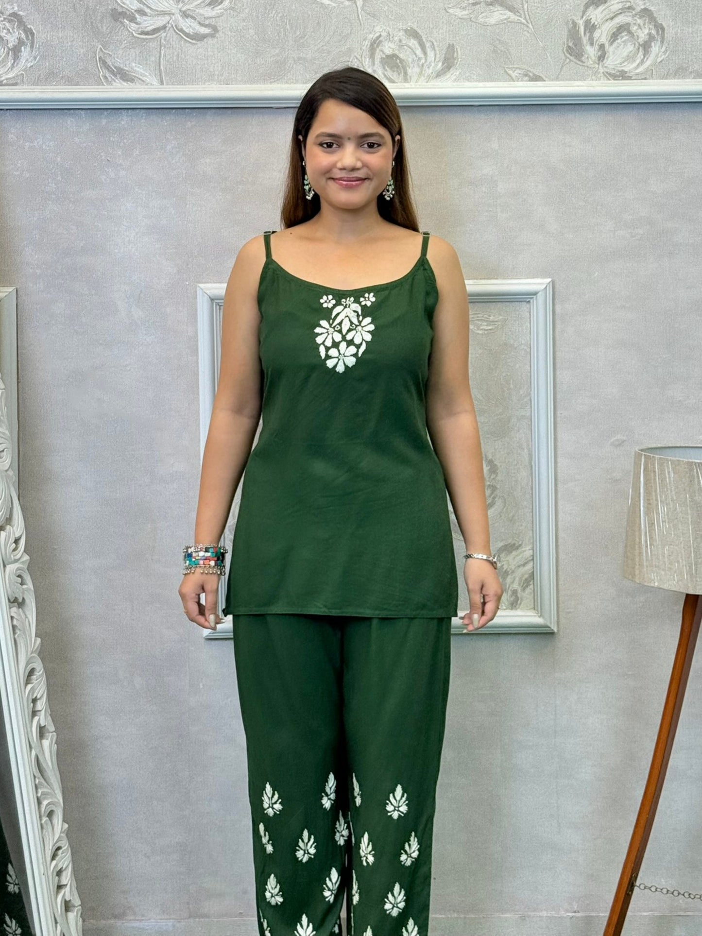 Dark green Lucknowi Chikankari 3-piece rayon set with sleeveless kurta, embroidered shrug, and pants