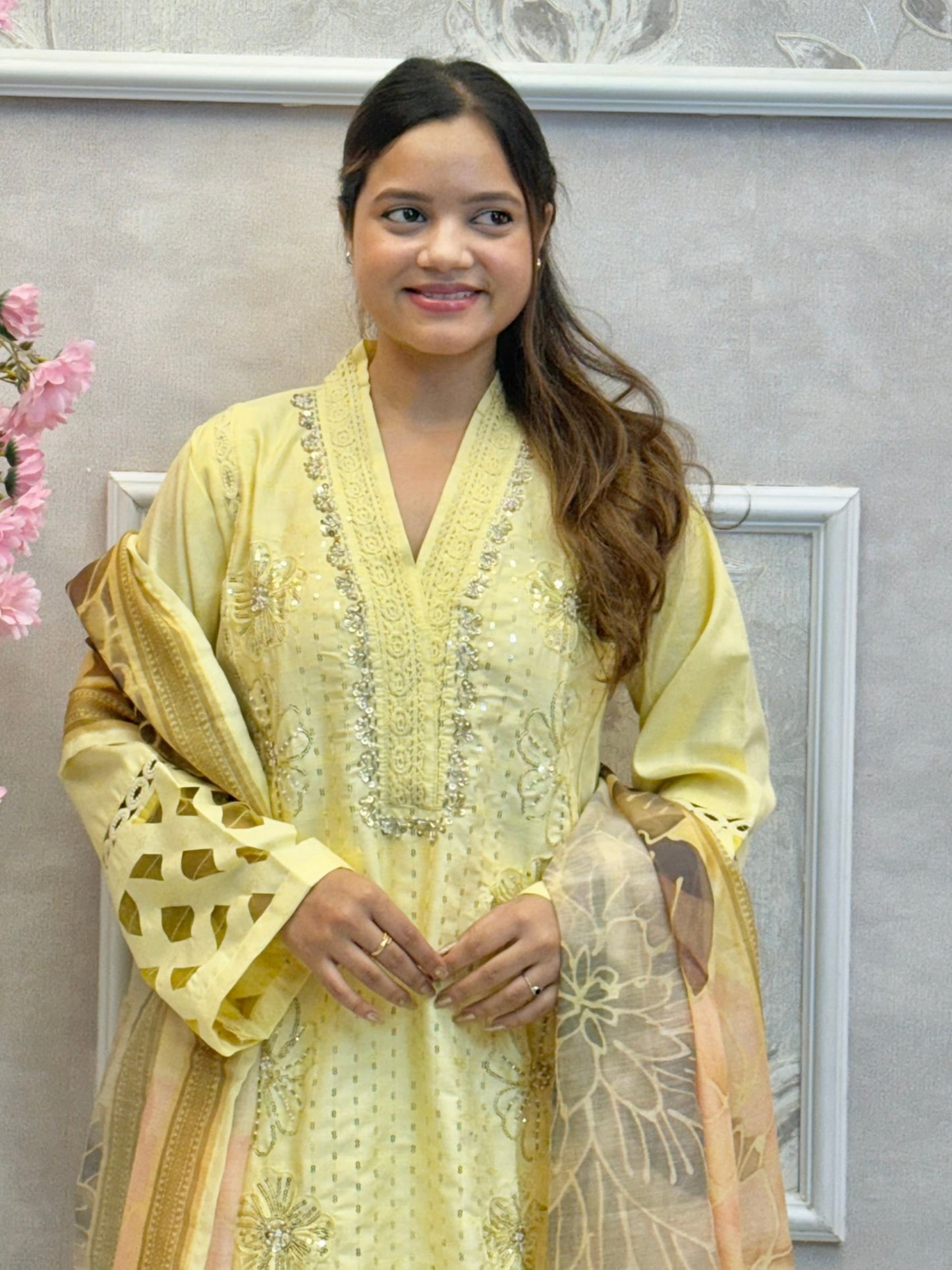 Lemon yellow rayon kurta set with hand embroidery and mirror work, printed dupatta, and matching pants