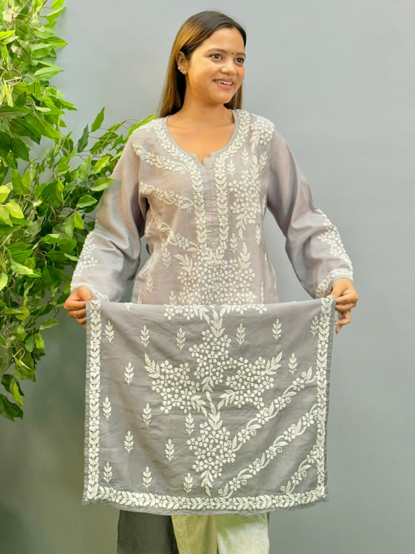 Model wearing ombre grey Chanderi chikankari kurta with intricate white 3D embroidery.
