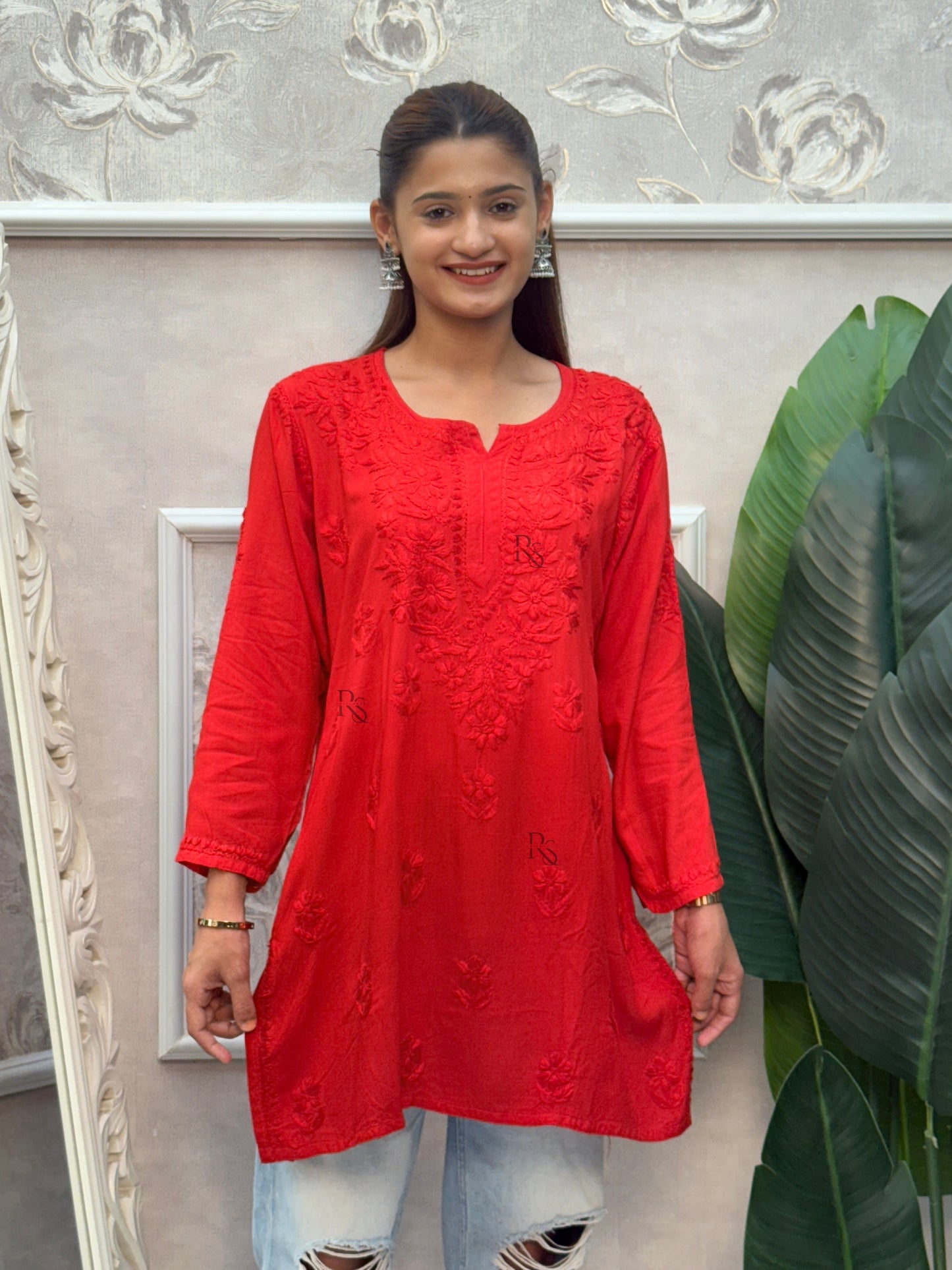 Red rayon Lucknow Chikankari short kurta with delicate hand embroidery.