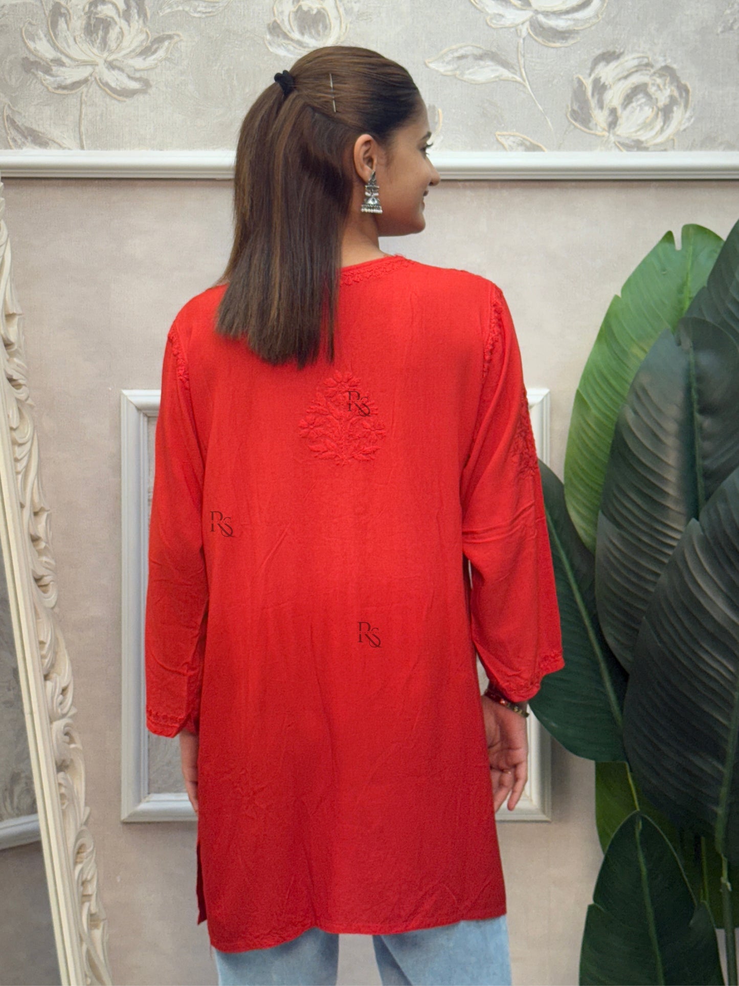 Red rayon Lucknow Chikankari short kurta with delicate hand embroidery.