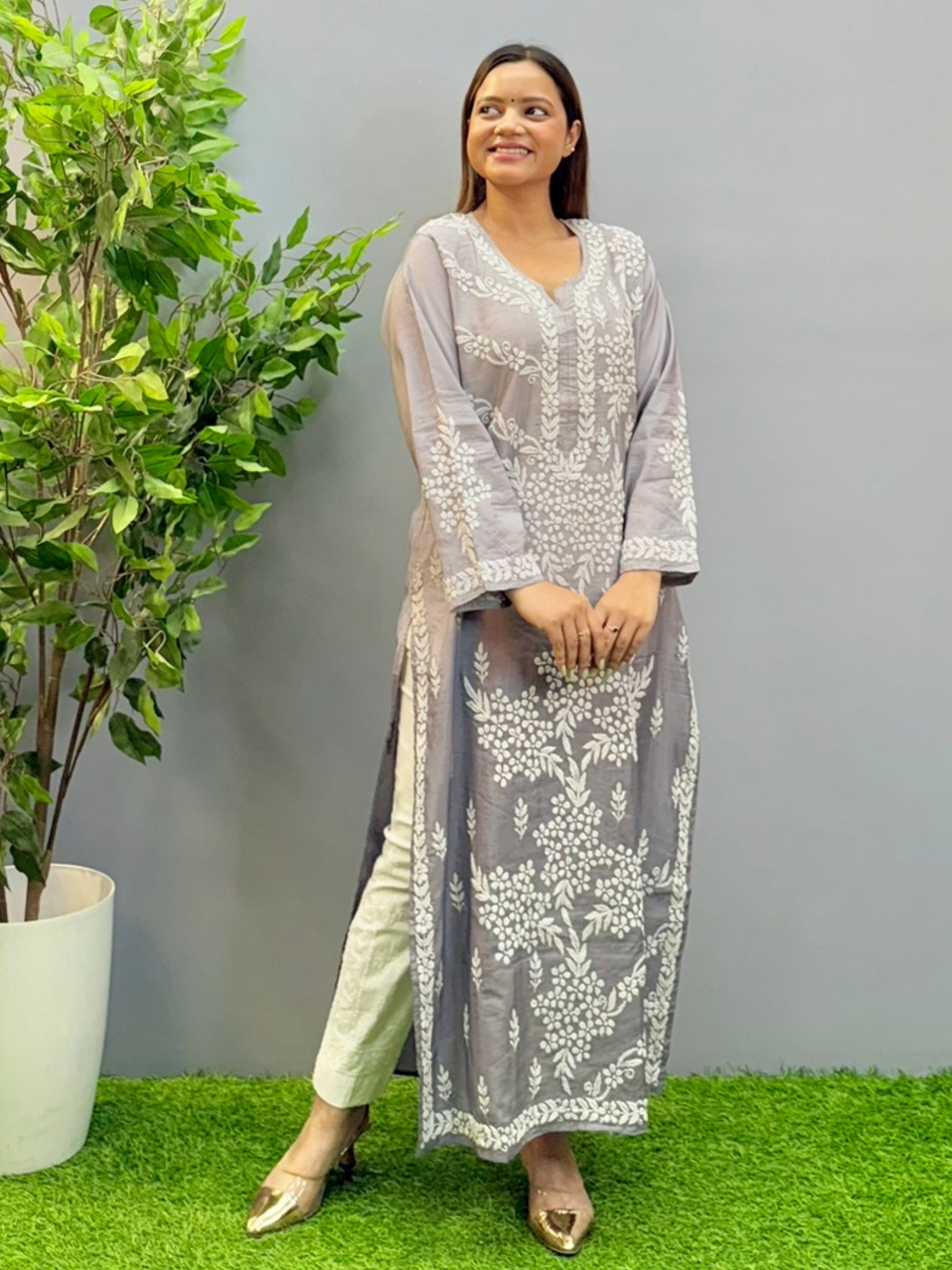 Model wearing ombre grey Chanderi chikankari kurta with intricate white 3D embroidery.