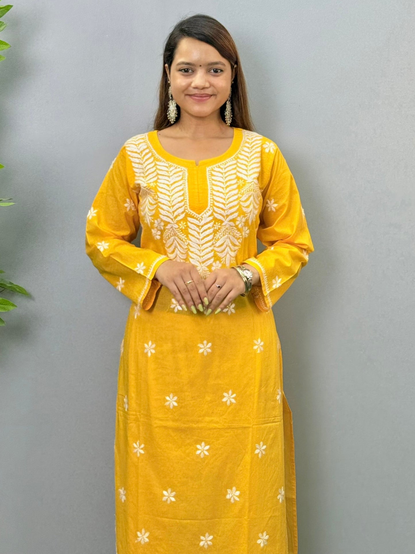 Sunshine yellow cotton Lucknow Chikankari kurta with white floral embroidery for casual wear