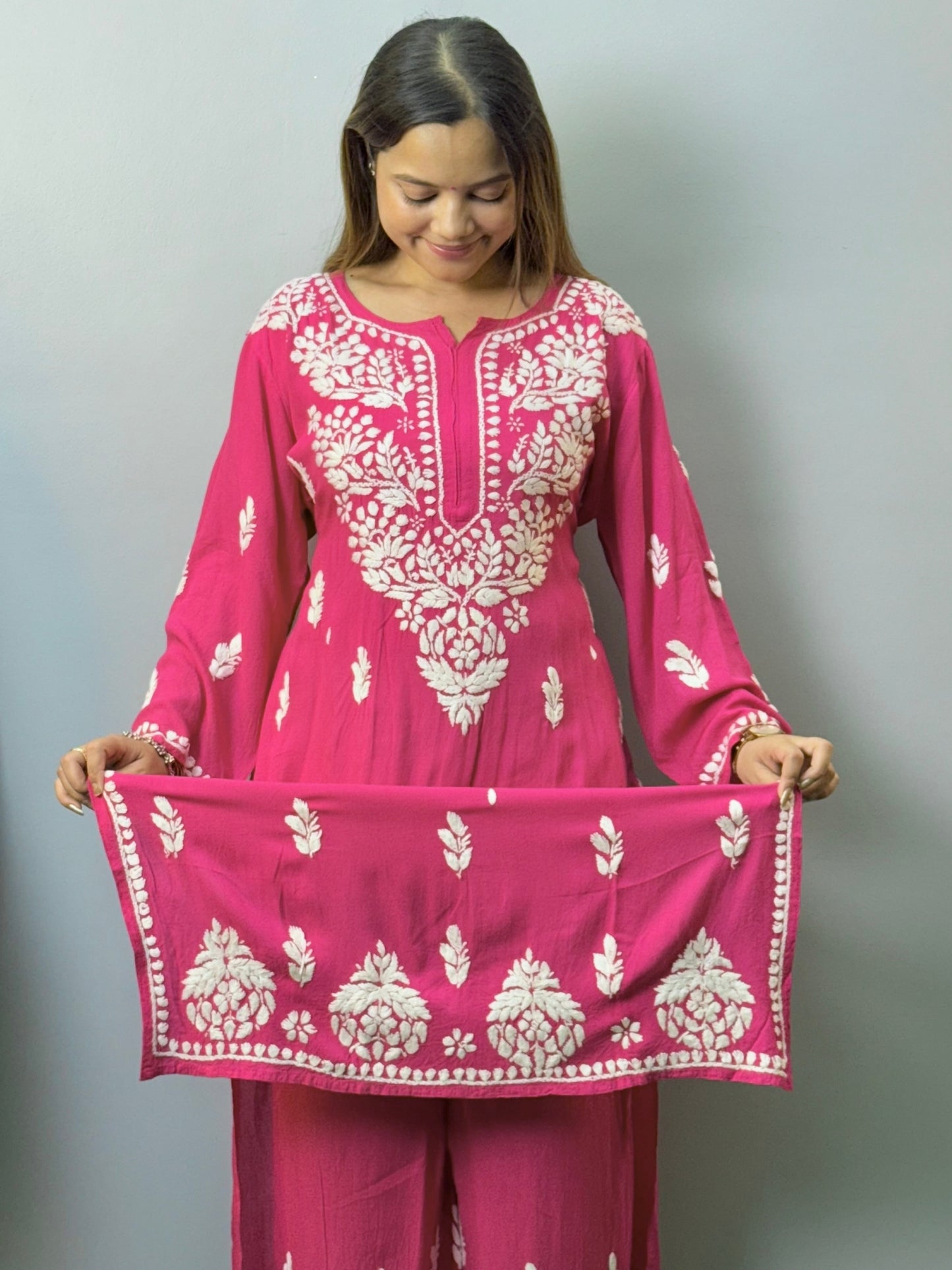 Rani pink rayon Lucknow Chikankari kurta with white hand embroidery and matching palazzo set