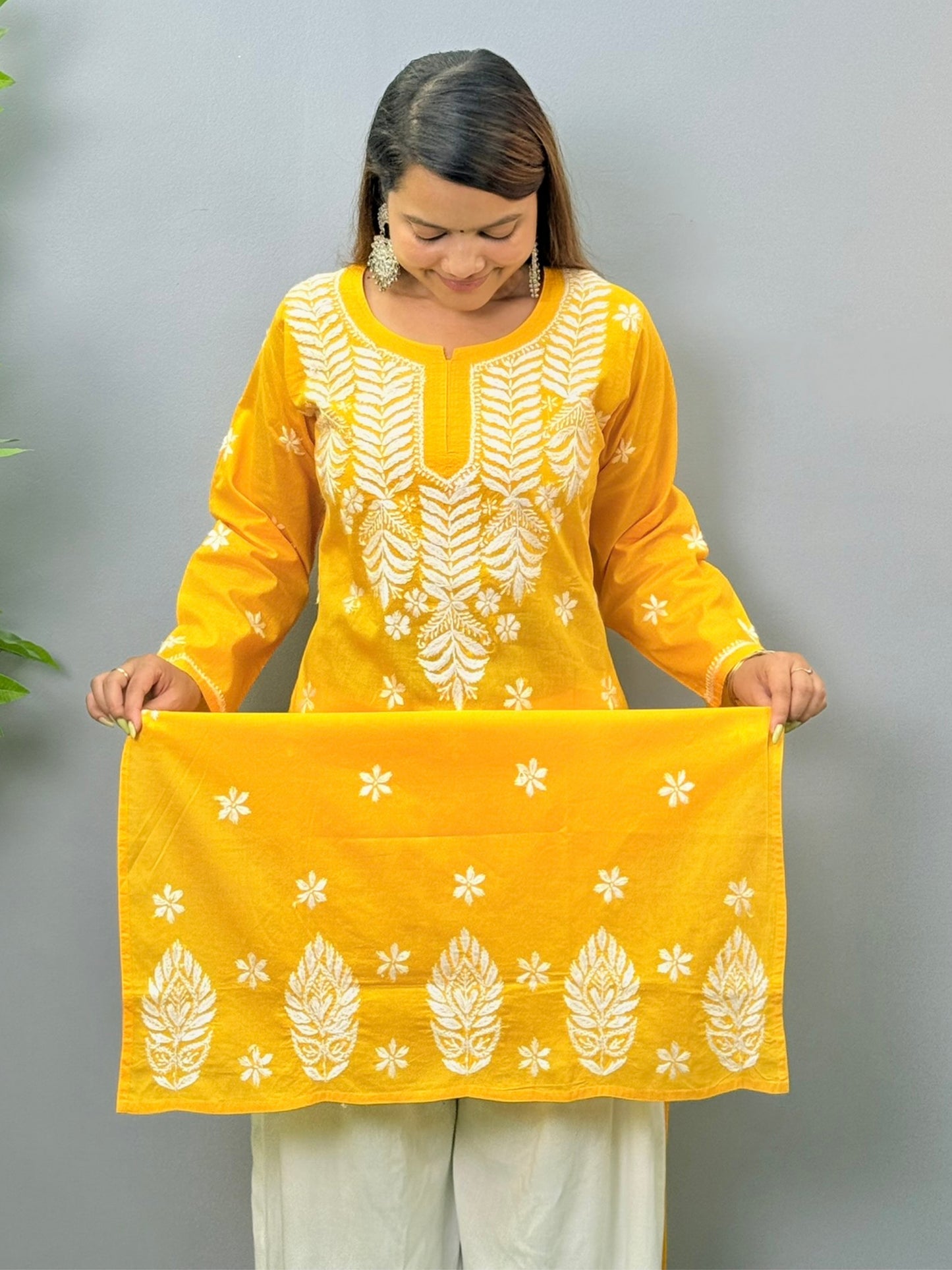 Sunshine yellow cotton Lucknow Chikankari kurta with white floral embroidery for casual wear