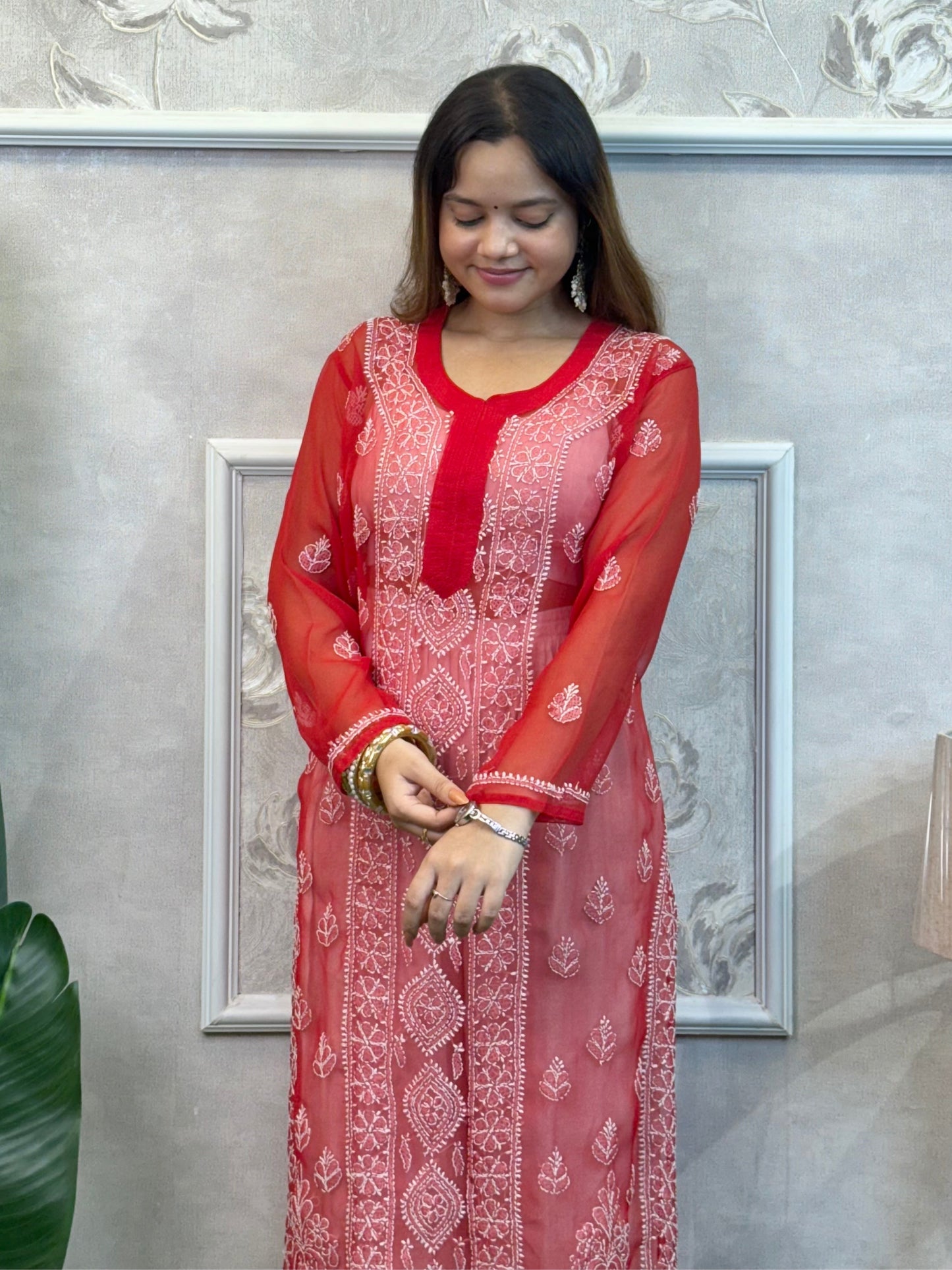Red transparent georgette Lucknow chikankari kurta with hand embroidery – casual wear.