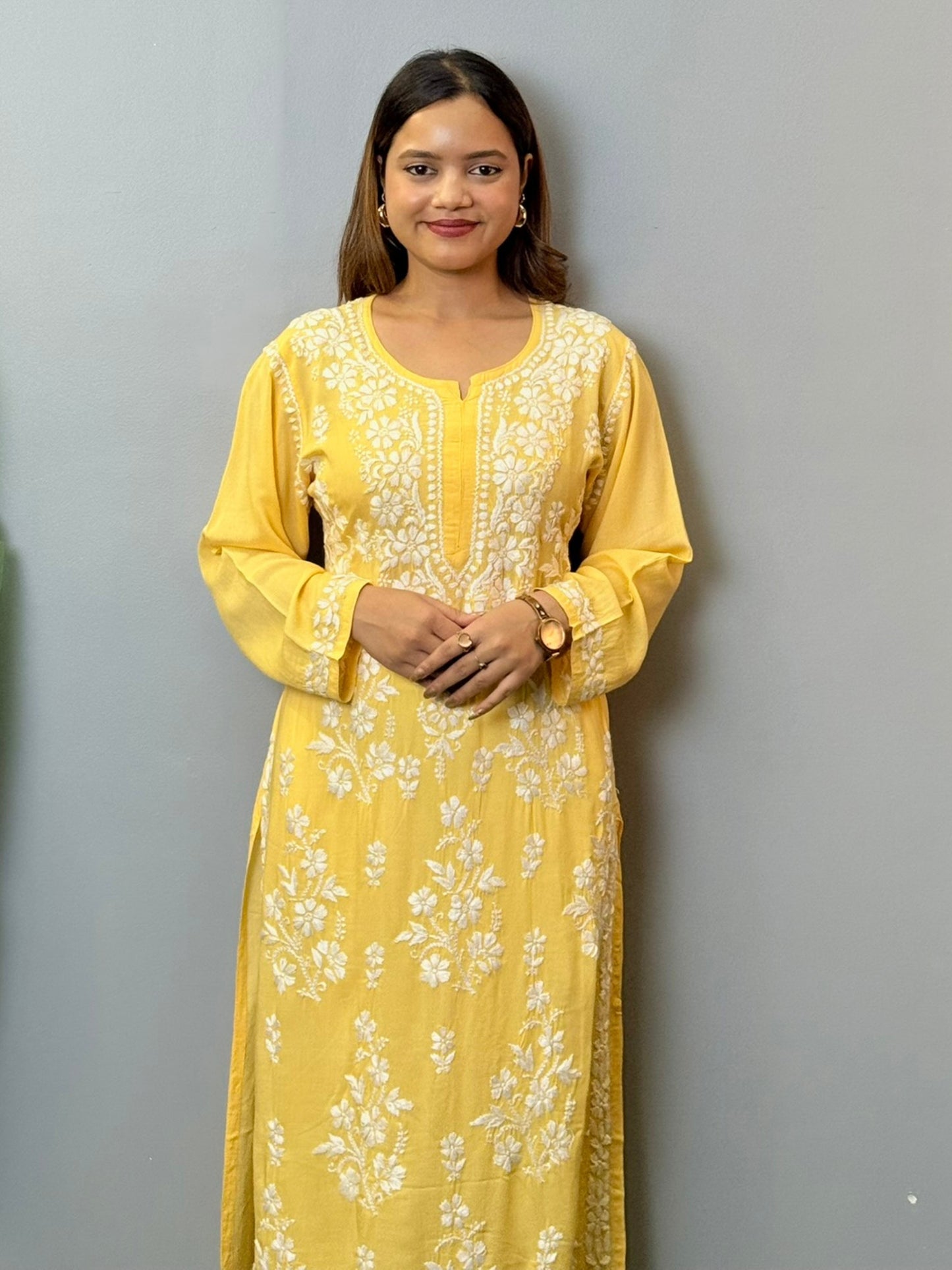 Sunshine yellow modal chikankari kurta with white floral hand embroidery on front and sleeves
